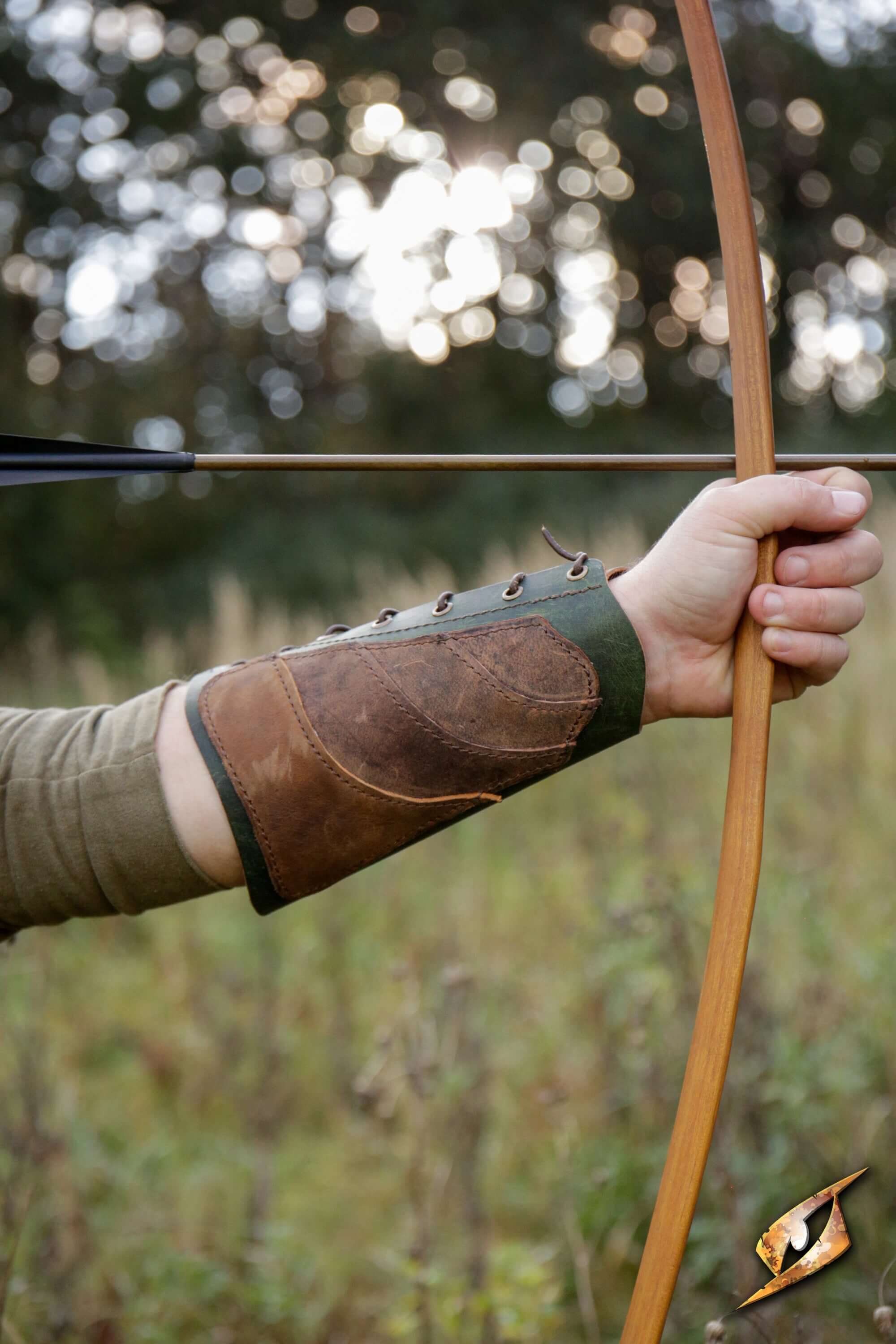 A person wearing a Glade Warden Bracer, drawing a bow in a forest setting.
