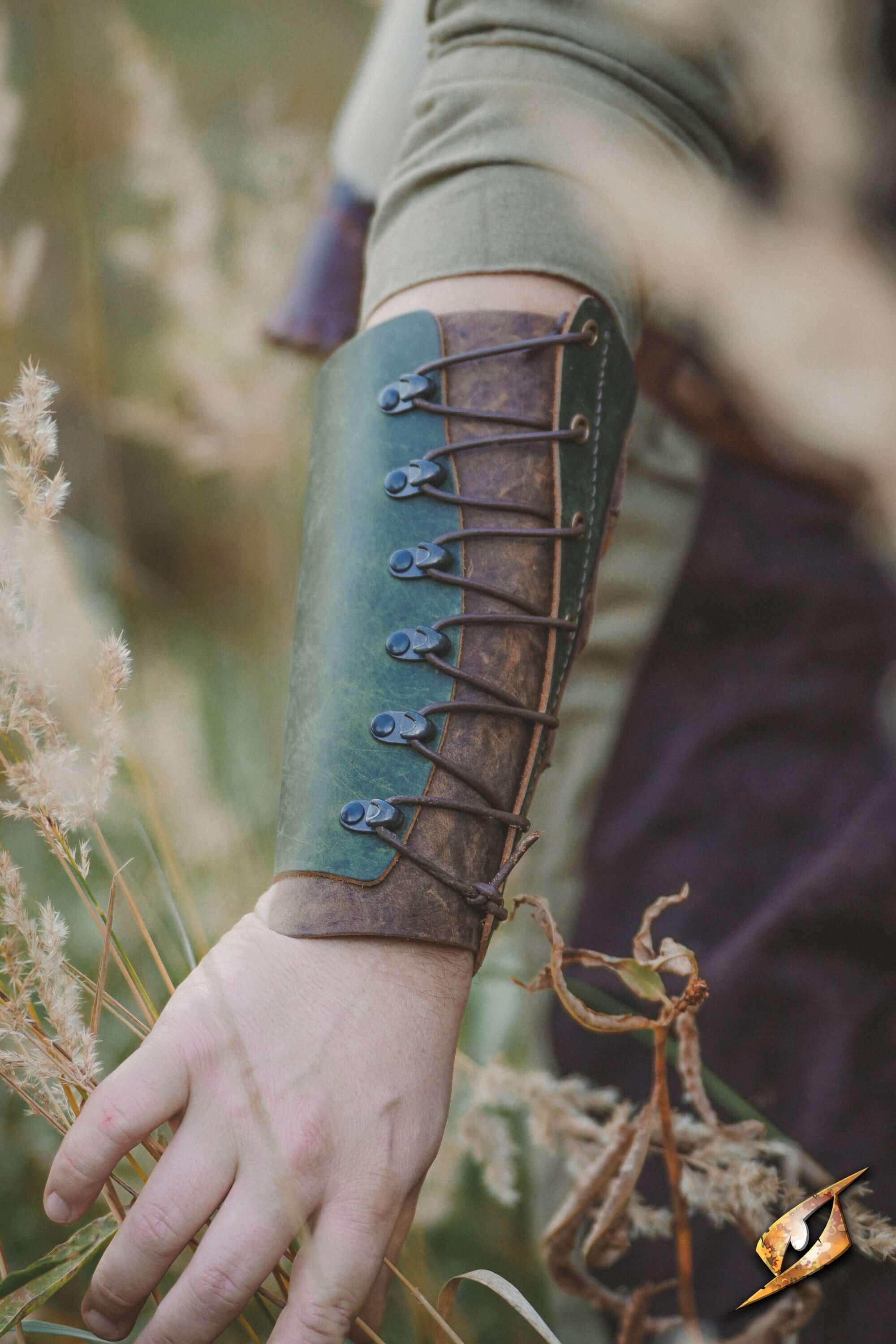 Glade Warden Bracer showcasing a handmade leather design for archery, perfect for silent movement in nature.