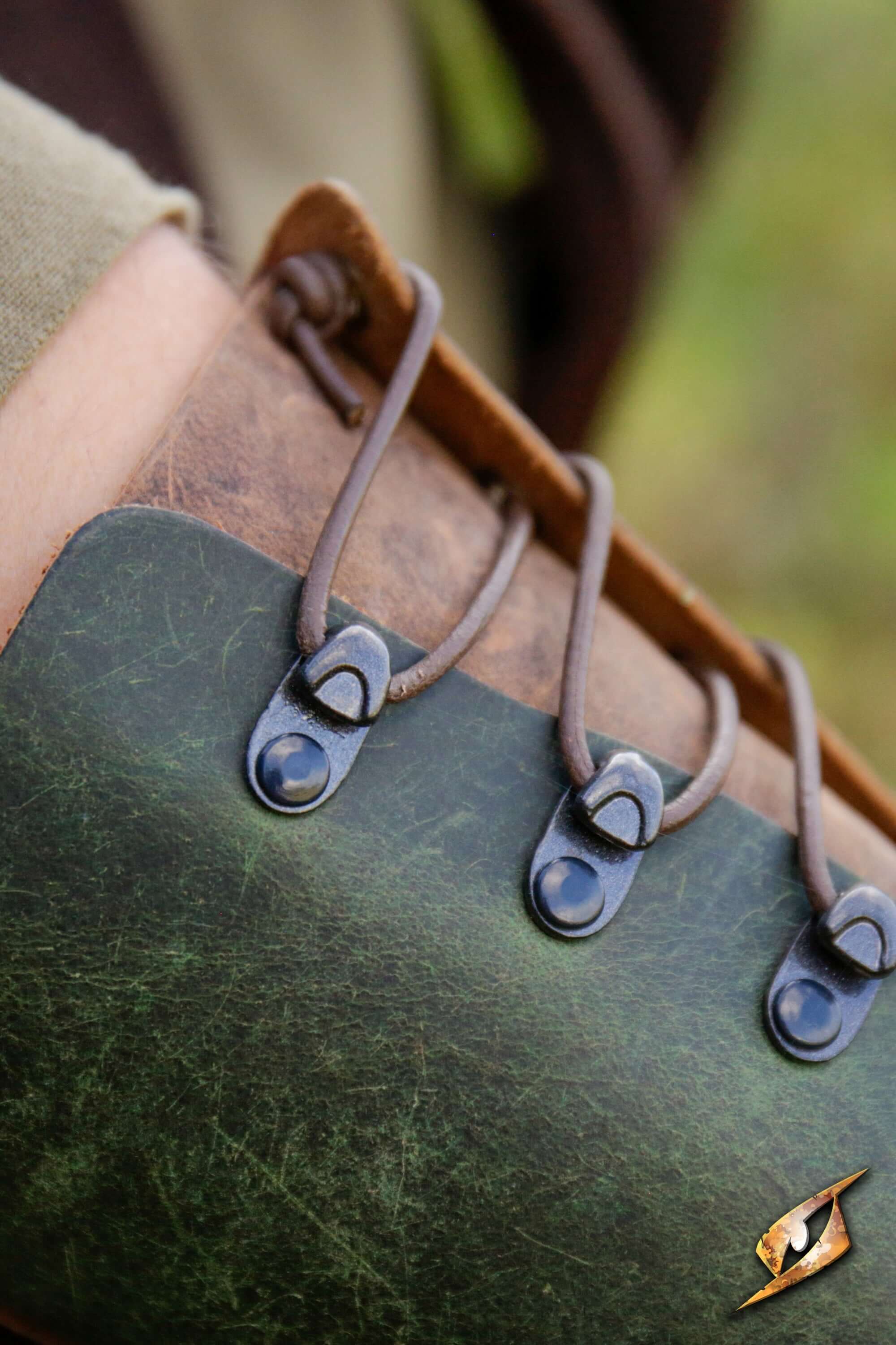 Close-up detail of the Glade Warden Bracer showcasing its leather laces and craftsmanship.