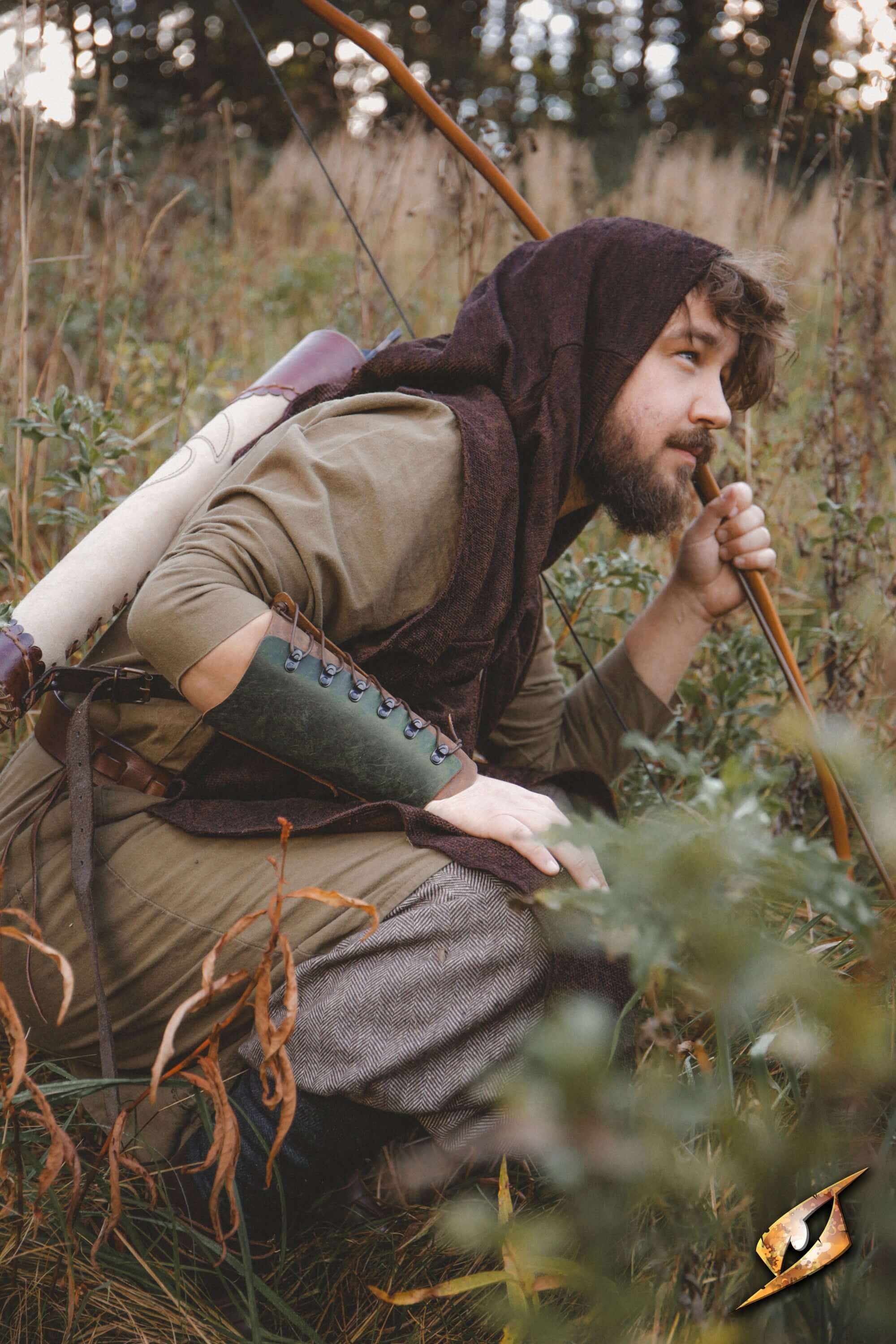 Glade Warden Bracer worn by an archer in a forest setting, showcasing comfort and style during archery.