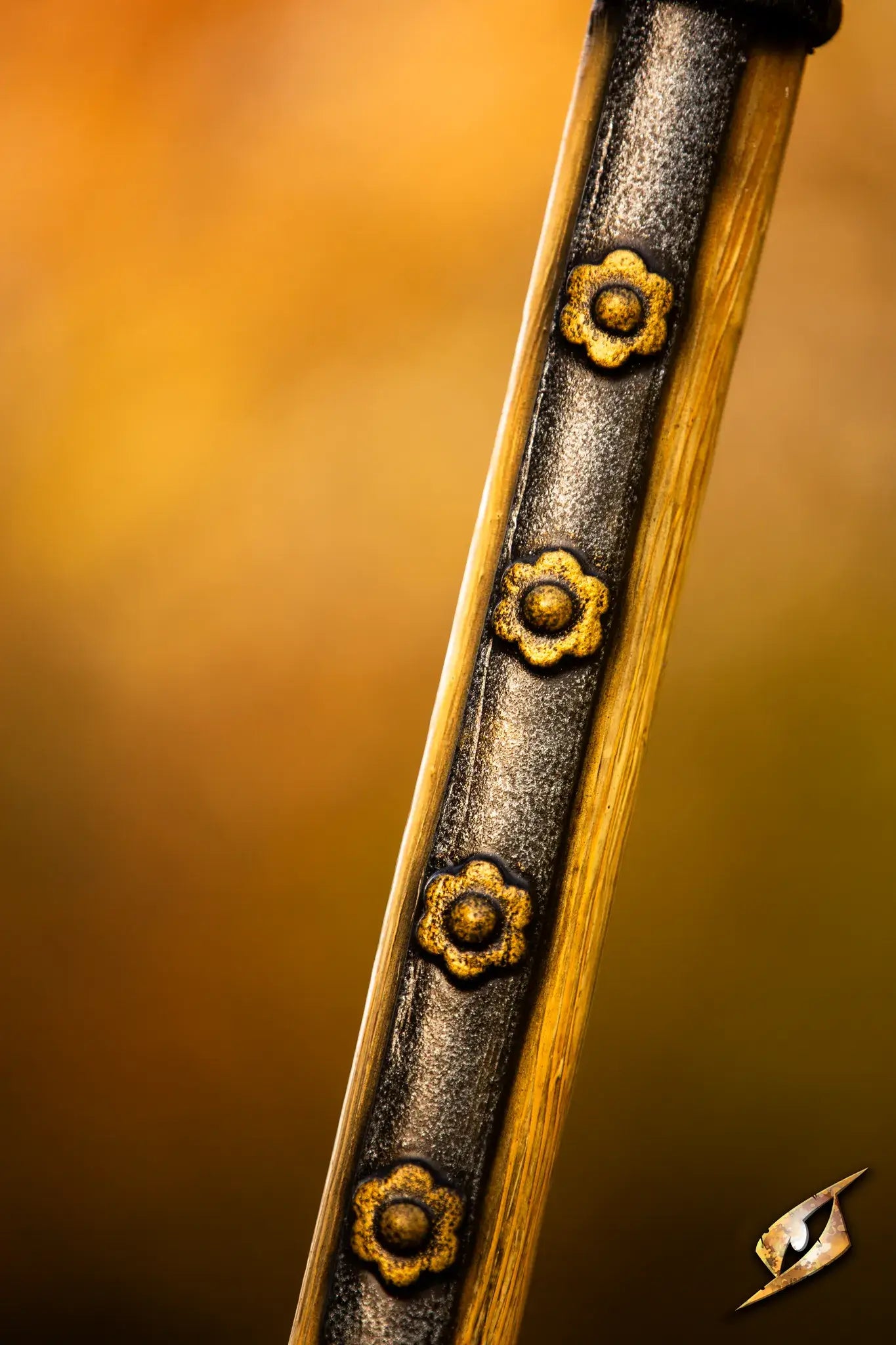 Close-up of the ornate detailing on the Battle Standard - Halberd Top, showcasing its decorative elements.