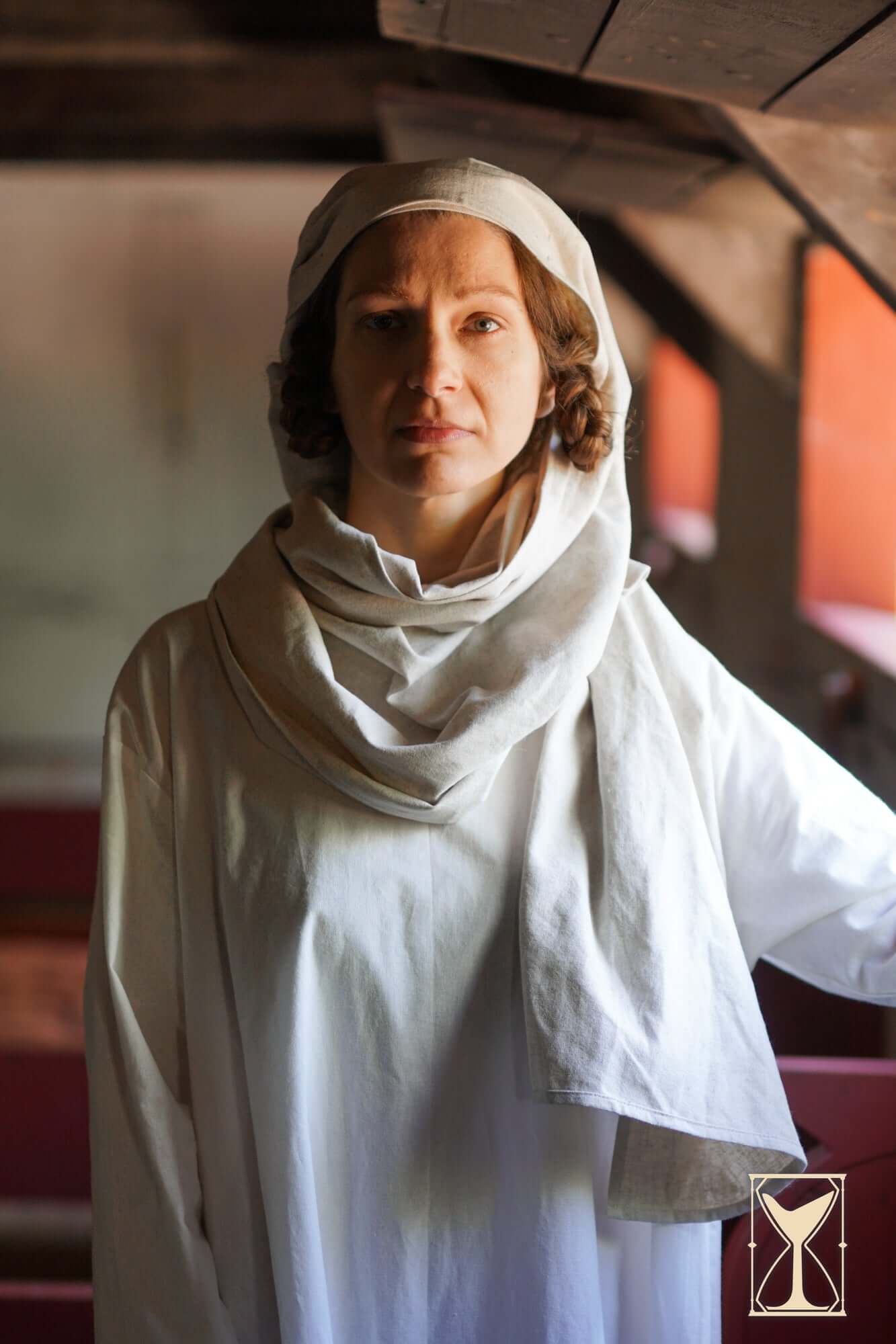 Rectangular Veil and Fillet - Cotton/Linen Blend worn by a model in a historical setting.