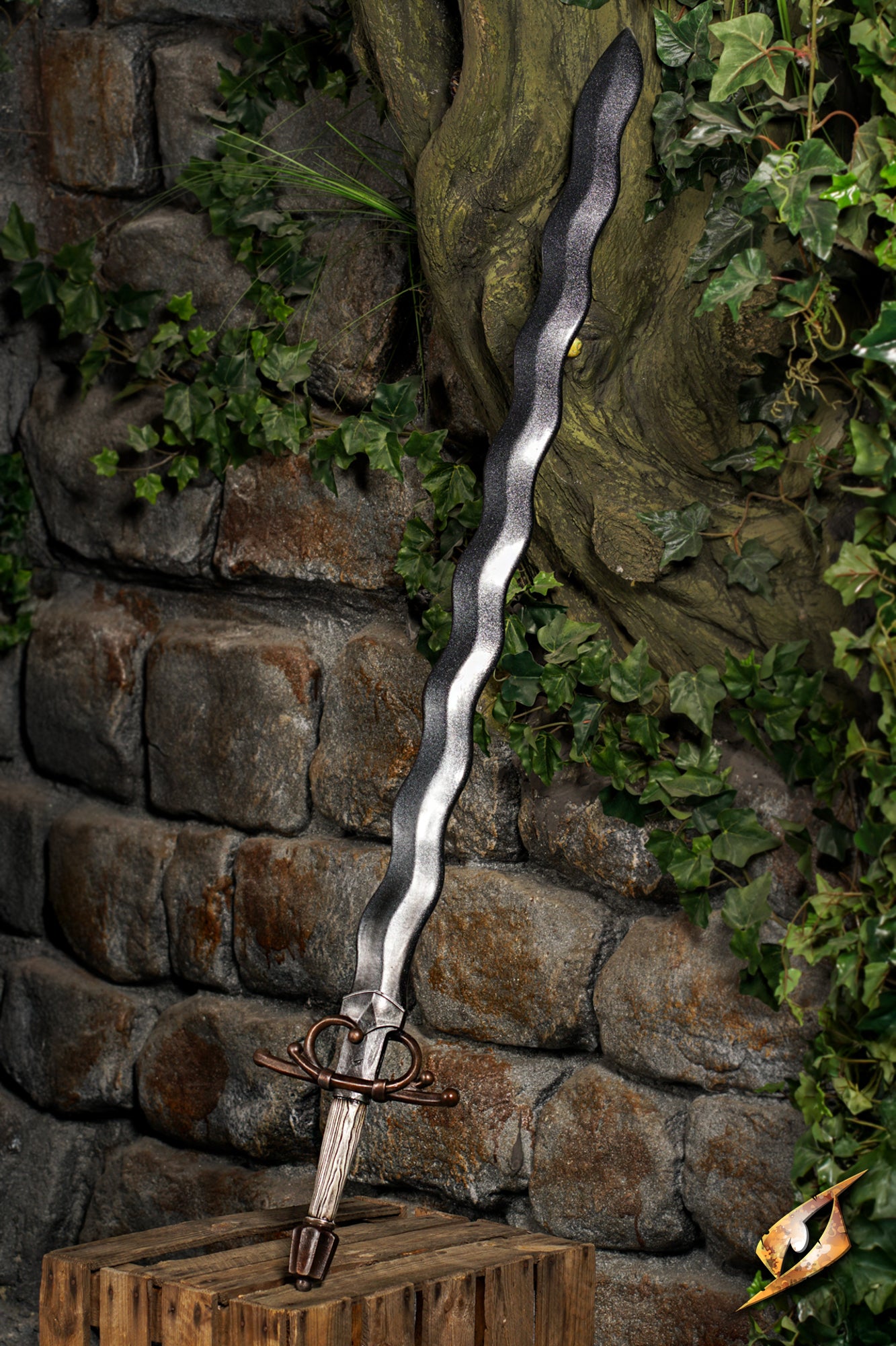 Noble Flamberge with a flame-shaped blade and sculpted swept hilt displayed against a stone wall.