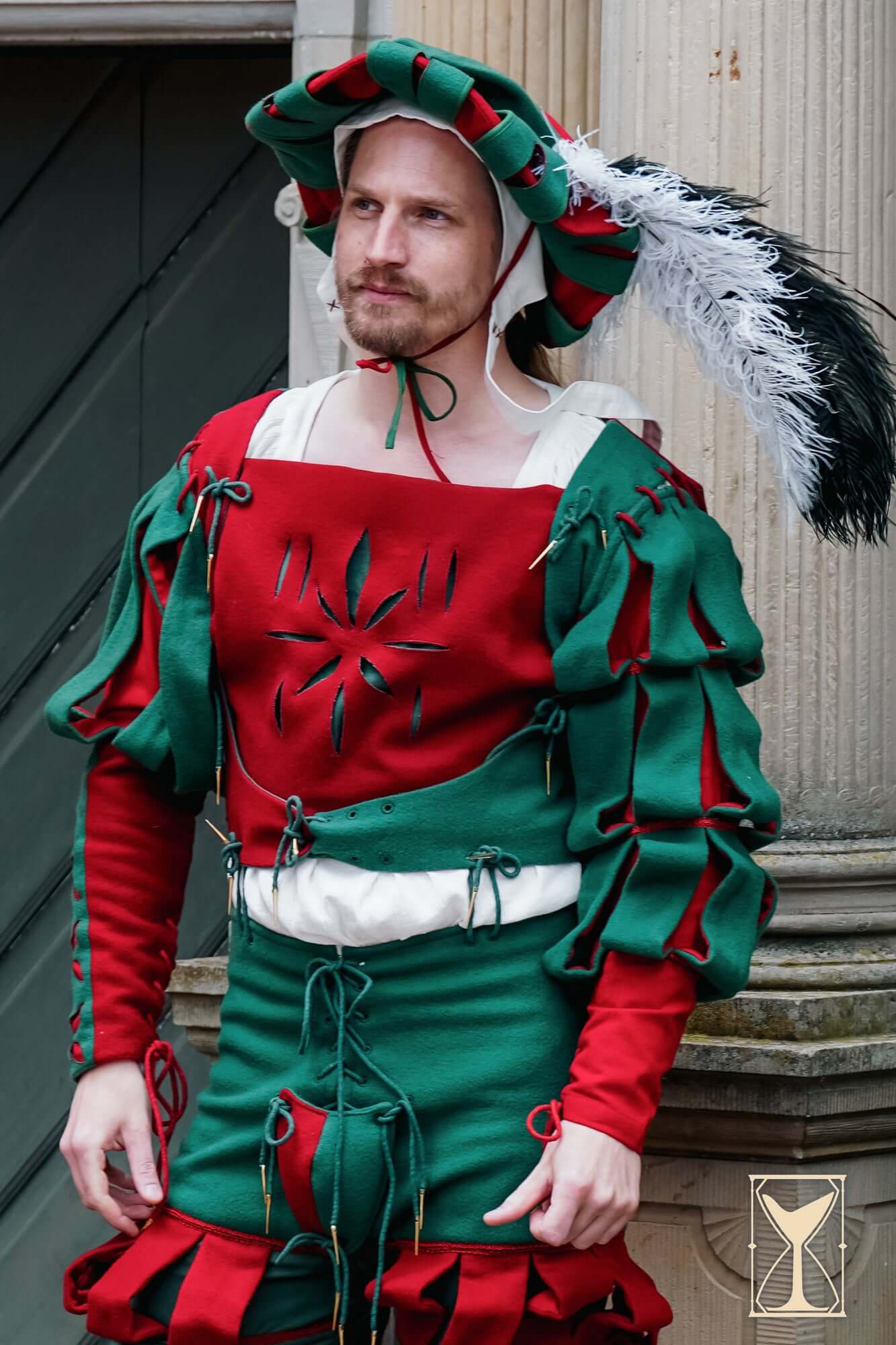 Landsknecht Waterfall Sleeve worn by a model in historical costume with bold colors and slashes.