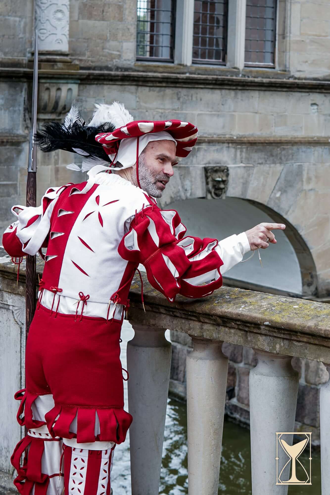 Landsknecht Waterfall Sleeve worn by a character in 16th-century attire, showcasing bold slashes and elegant design.