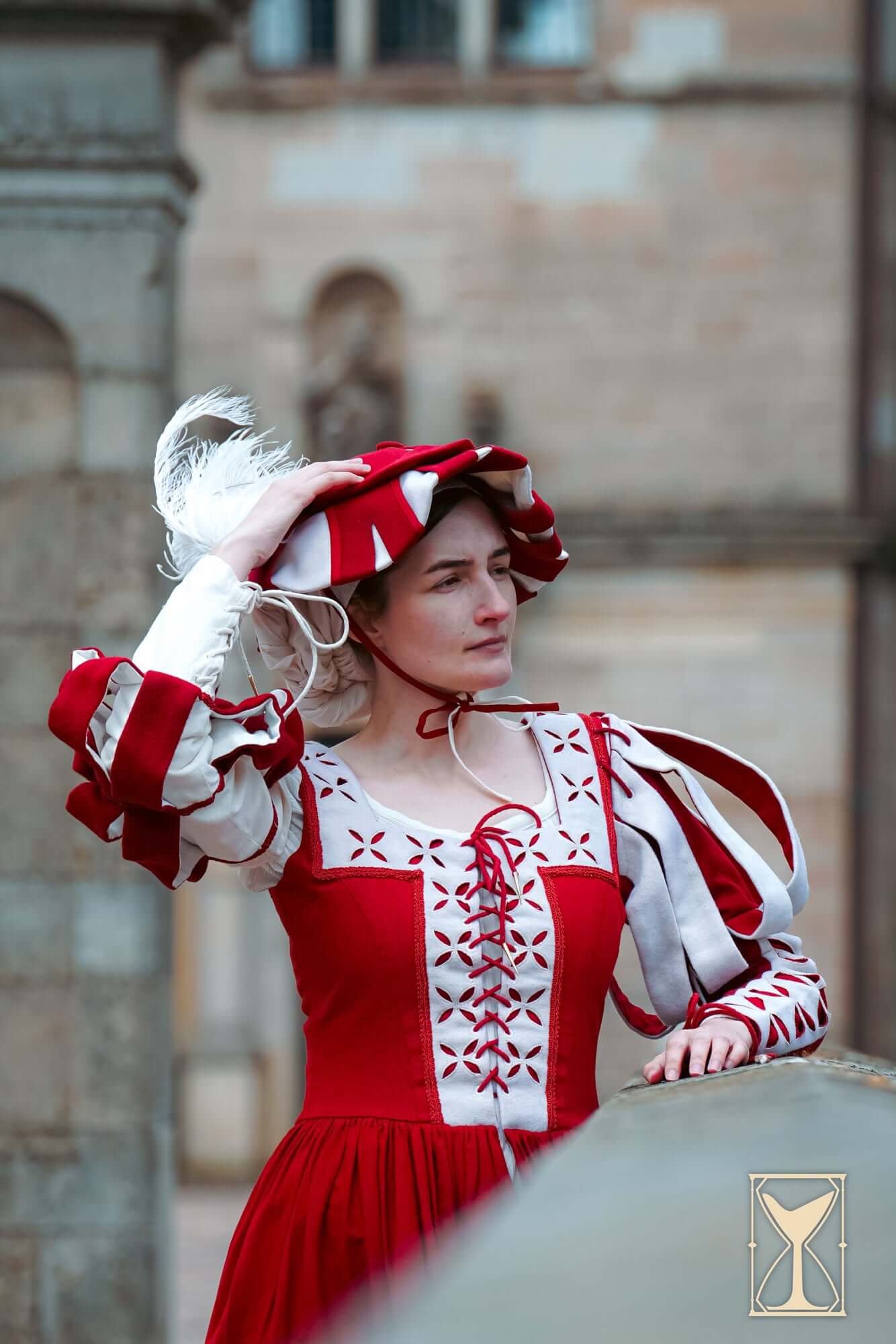 Landsknecht Waterfall Sleeve worn by a woman in traditional 16th-century attire, showcasing bold colors and details.
