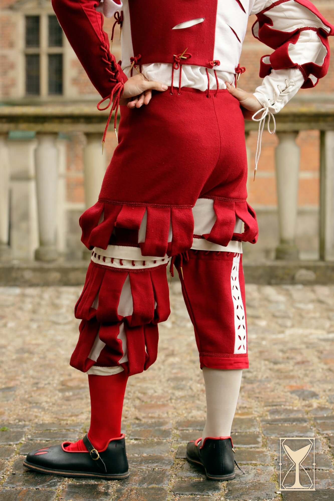 Landsknecht Breeches featuring bold slashes and two-tone hues, perfect for Renaissance fashion. Historical 16th-century style.