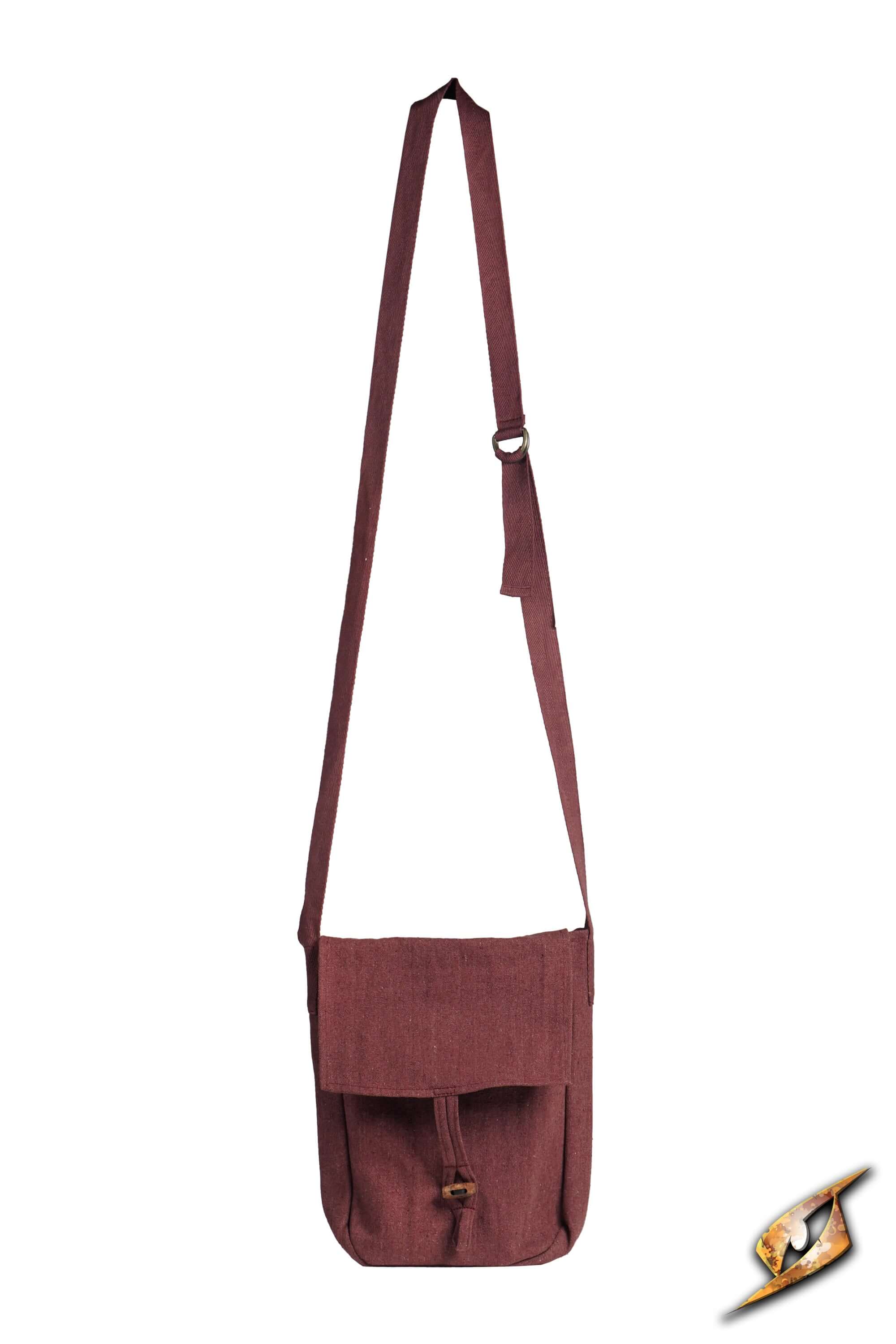 Traveler Satchel - Canvas in rustic maroon color with an adjustable strap for everyday use.