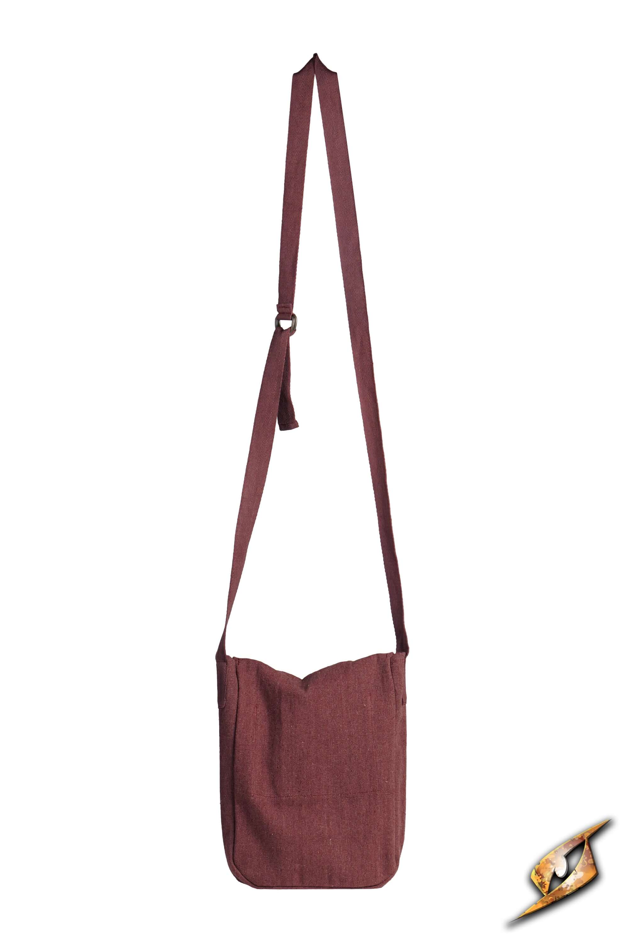 Traveler Satchel - Canvas in a maroon color, perfect for outdoor adventures and everyday use.