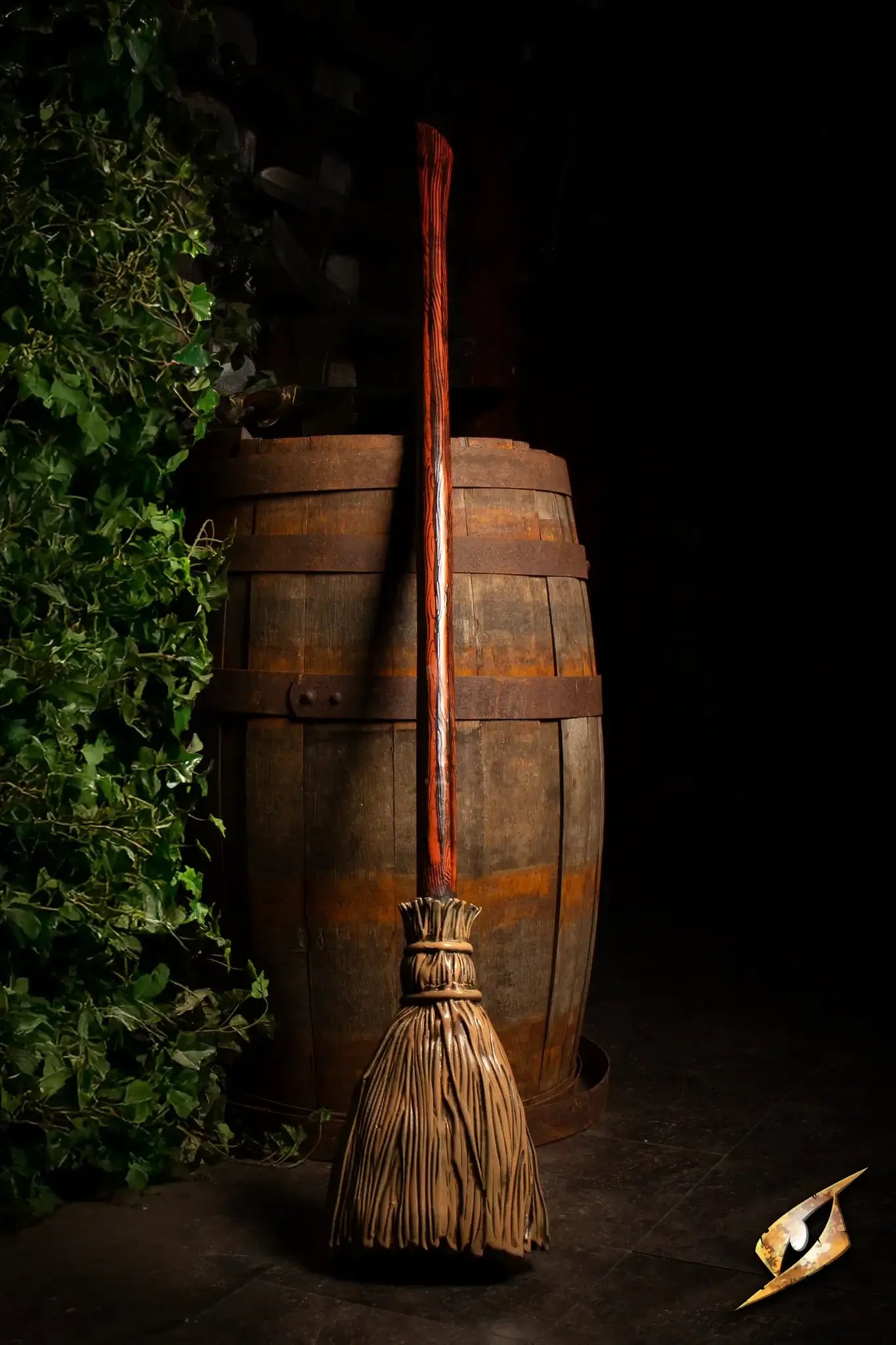 Broomstick prop with detailed bristles and wooden handle, perfect for cleaning or role-play, by Epic Armory.