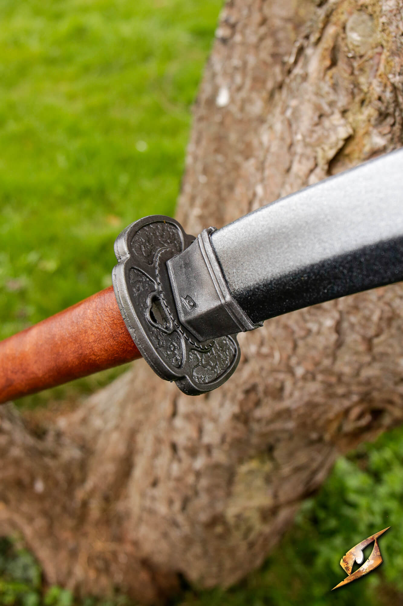 Naginata compact detail showing the hybrid blade and haft mechanism, perfect for travel and combat.