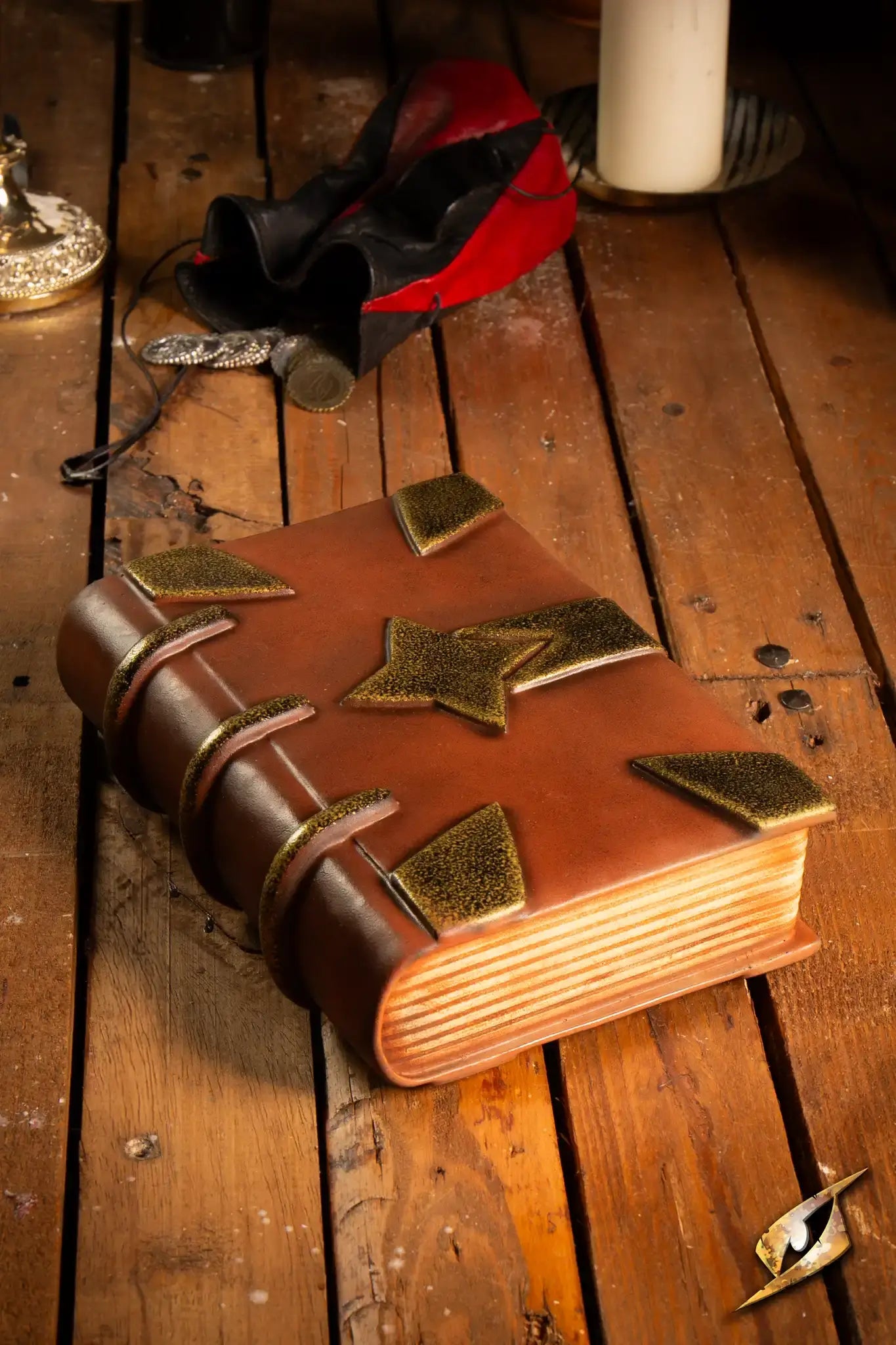 Book with a worn leather cover and weathered metal corners, perfect for LARP adventures and tavern battles.