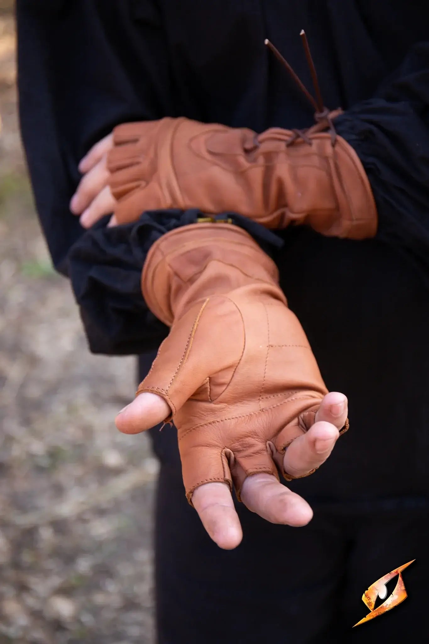 Thief Gloves worn by a person with hands open, displaying detailed craftsmanship and unique design features.