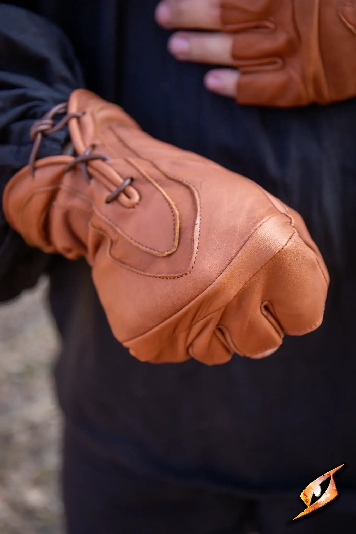 Close-up of Thief Gloves in tan leather, highlighting the unique design and craftsmanship.
