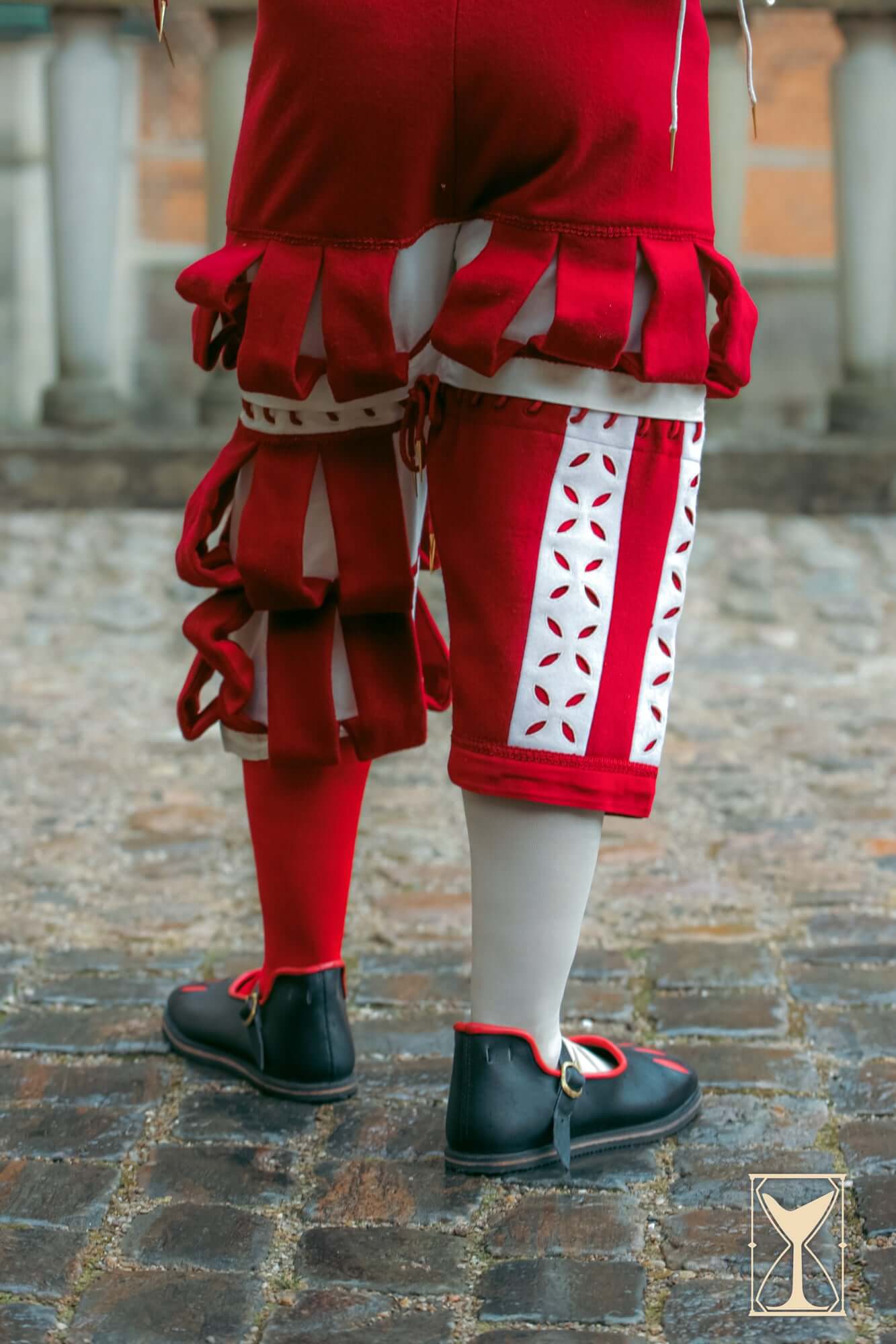 Rich Landsknecht Shoes worn with colorful Renaissance-style pants, showcasing historical fashion details.