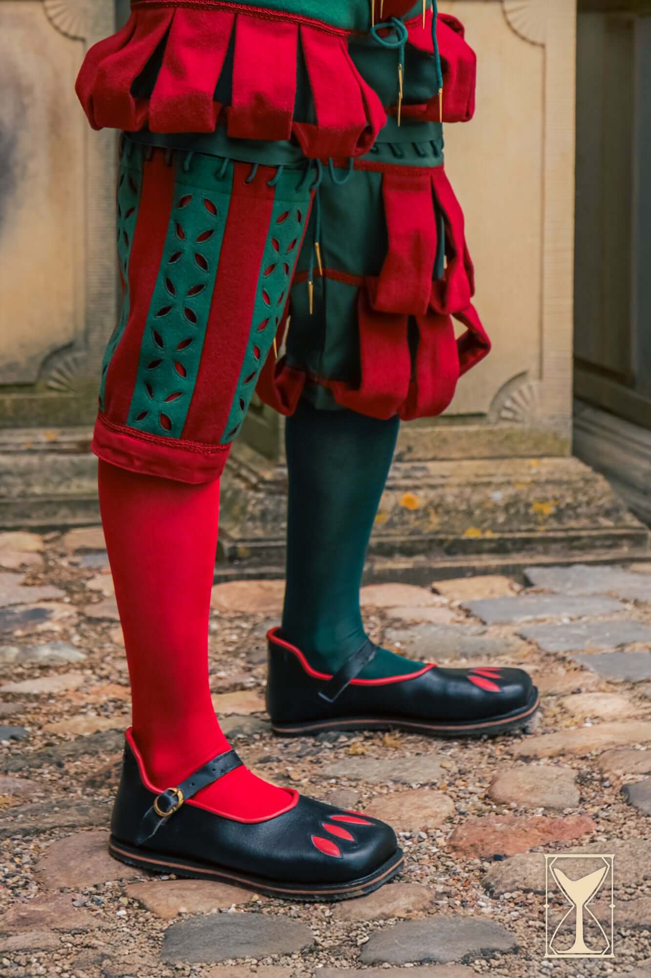 Rich Landsknecht Shoes worn with flamboyant Renaissance outfit, showcasing iconic wide slashed design.