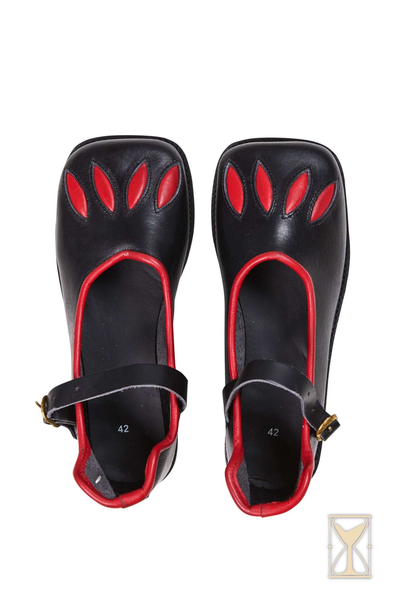 Rich Landsknecht Shoes featuring black leather design with red accents and unique cut-out details on the front.