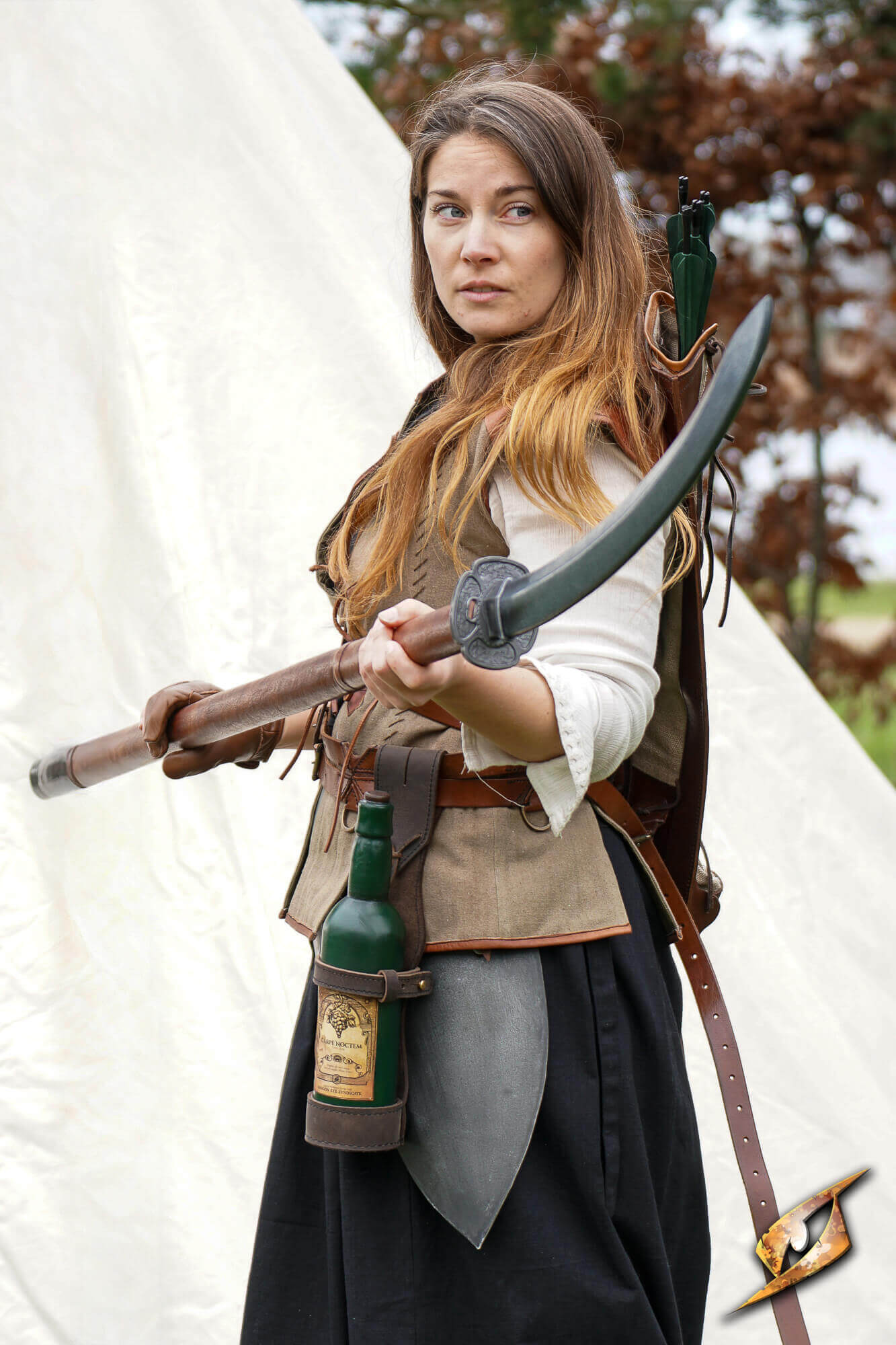 Bottle Holder - Dark Brown leather holder mounted on belt, securely carrying a wine bottle, worn by a woman in costume.