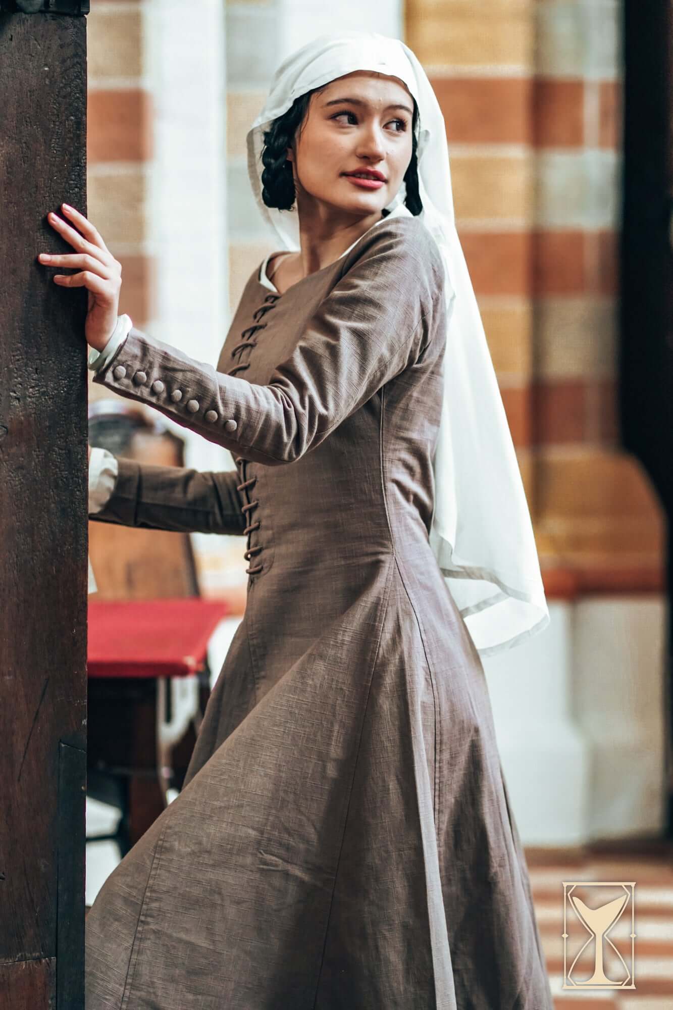 Cotehardie Marian dress showcasing a tailored fit, central lacing, and historical design from the Yoremade collection.