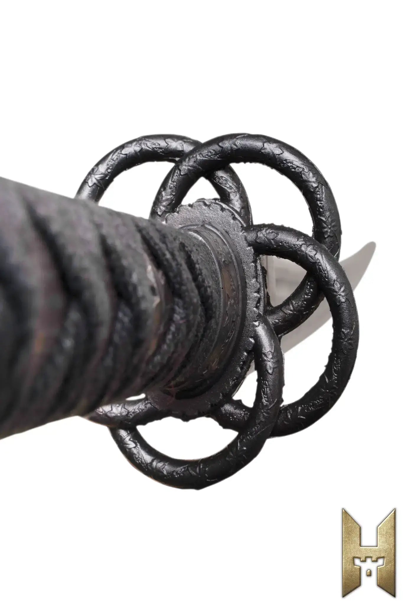 Detailed view of the hilt of Ryūgan the Katana showcasing its unique design and craftsmanship.