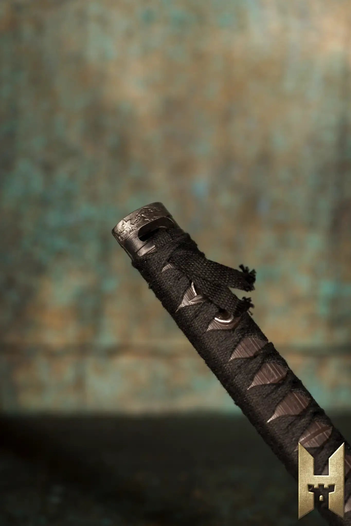 Ryūgan the Katana handle, showcasing its elegant design and craftsmanship from the Stronghold Masters Collection.