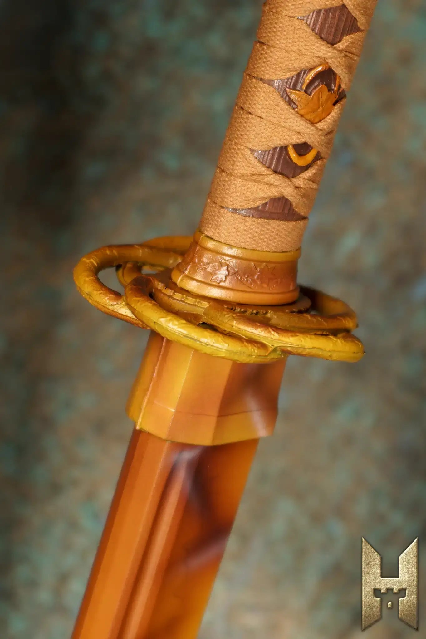 Close-up of Ryūgan the Katana showing the hilt and guard design for LARP enthusiasts.