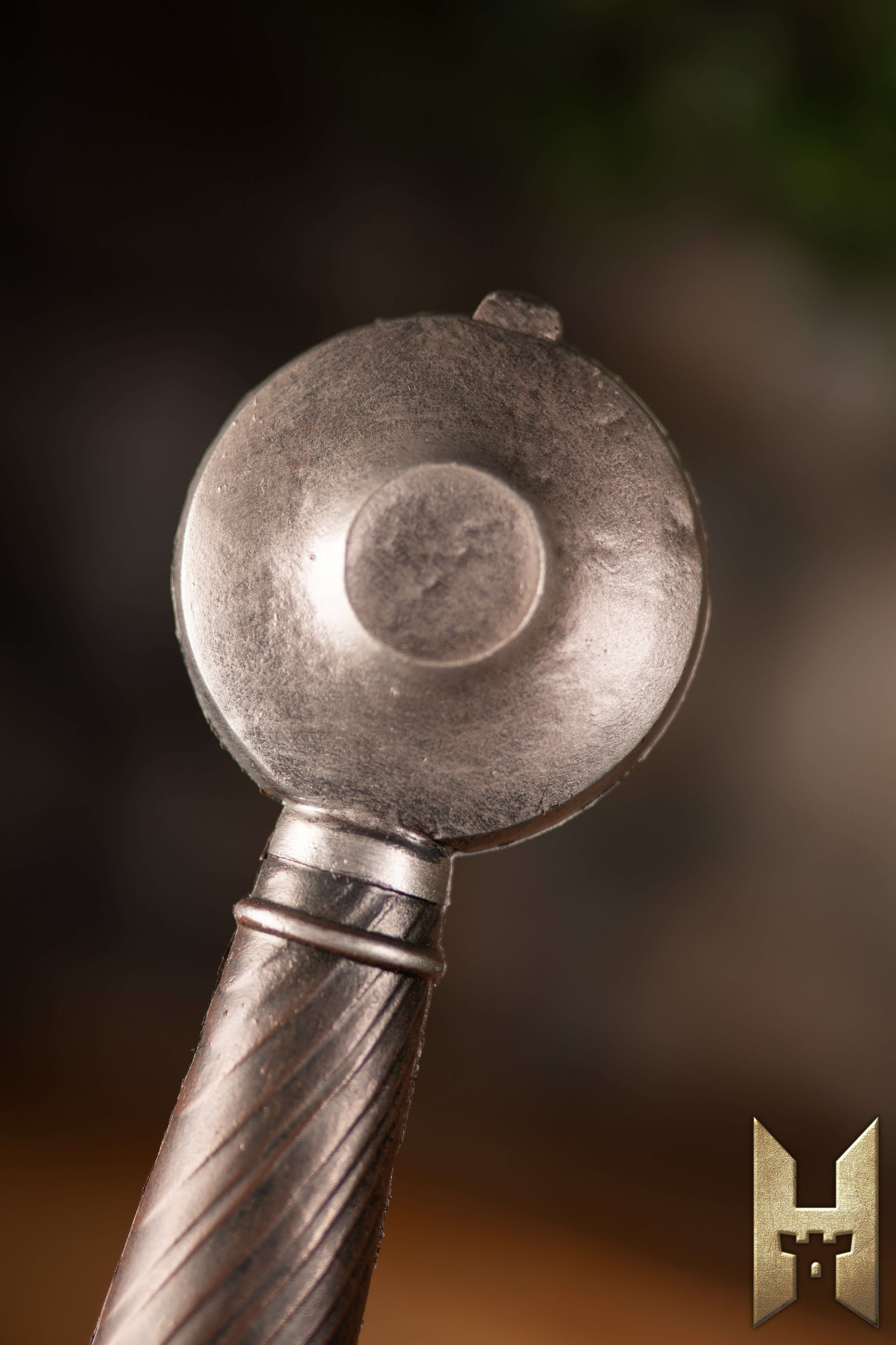 Close-up view of the hilt of a Milanese Sword from the Epic Armoury Stronghold Masters Series.