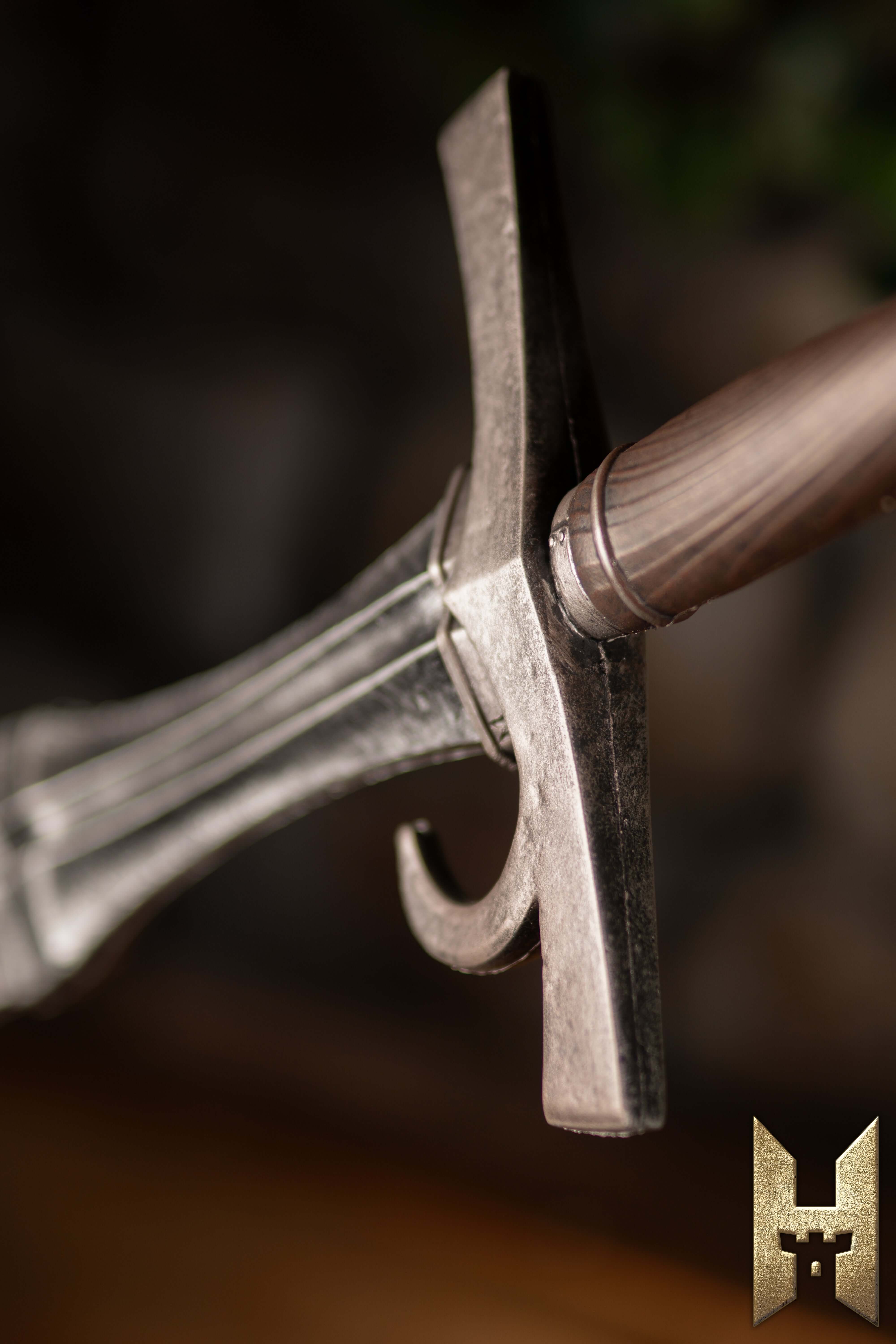 Close-up view of the hilt of the Milanese Sword from Epic Armoury's Stronghold Master Collection.