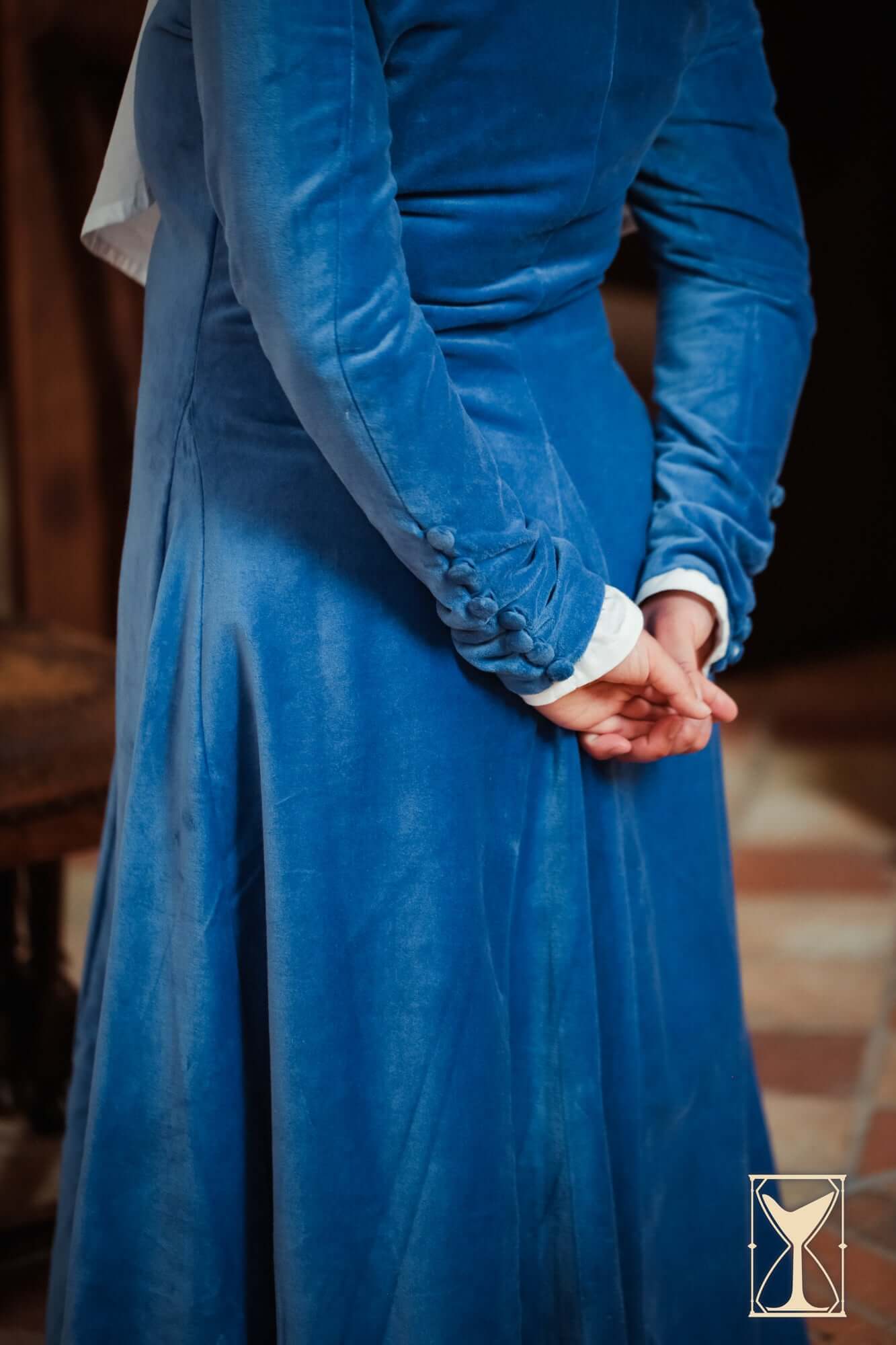 Cotehardie Colette blue velvet dress showing fitted back and button details for historical reenactments.