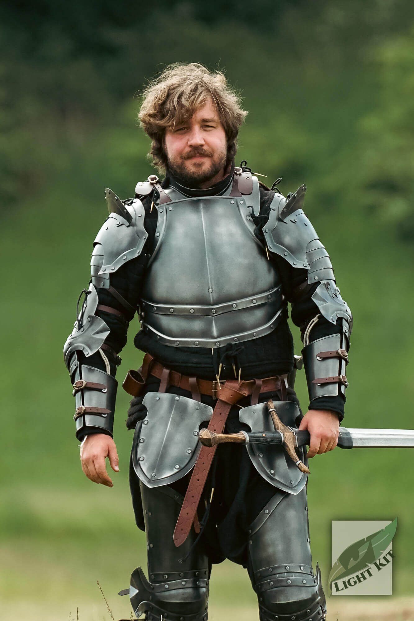 Captain Pauldrons - Light Kit worn by a warrior, showcasing the lightweight design and authentic armor style.