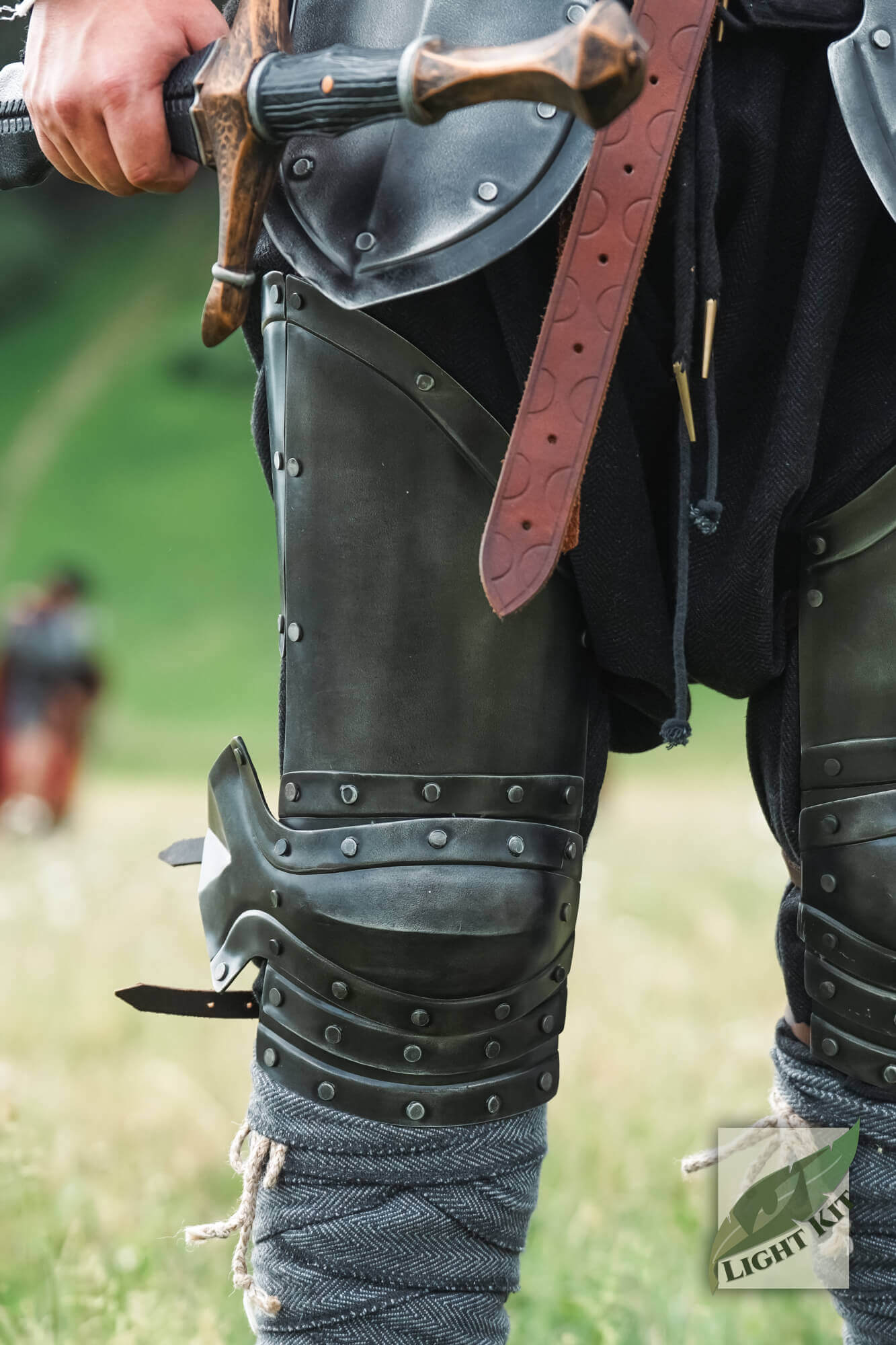 Captain Leg Protection - Light Kit displaying full leg coverage with ridged and riveted design.