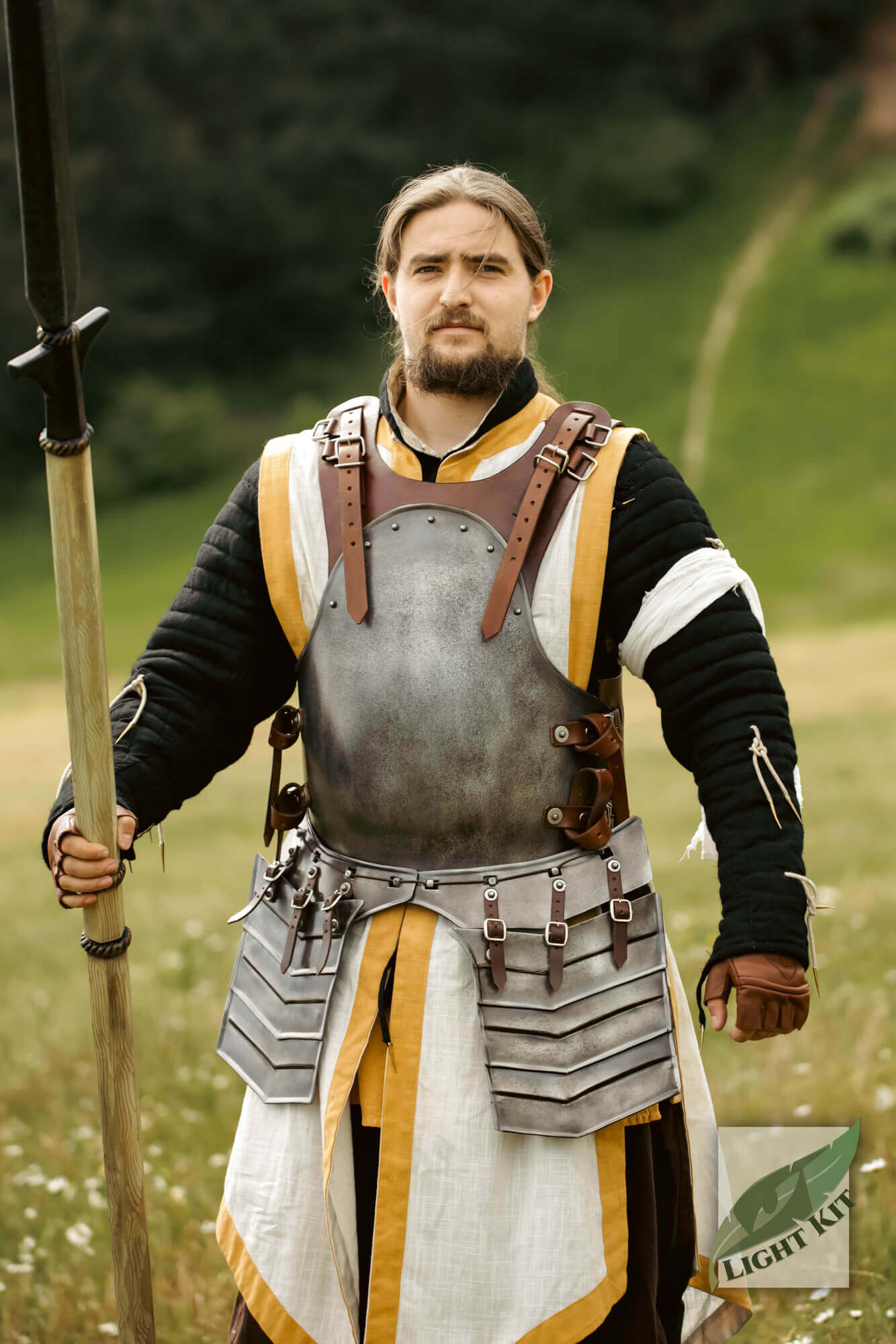 Torso Armour Merc - Light Kit worn by a spearman in a field, showcasing its mobility and historical design.