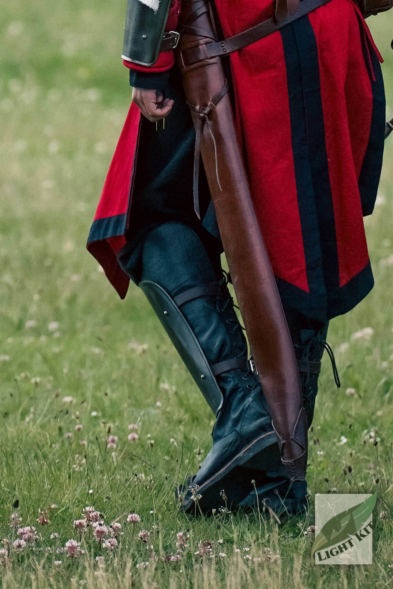 RFB Leg Protection - Light Kit worn by a character in a red outfit, showcasing shin guards on a grassy field.