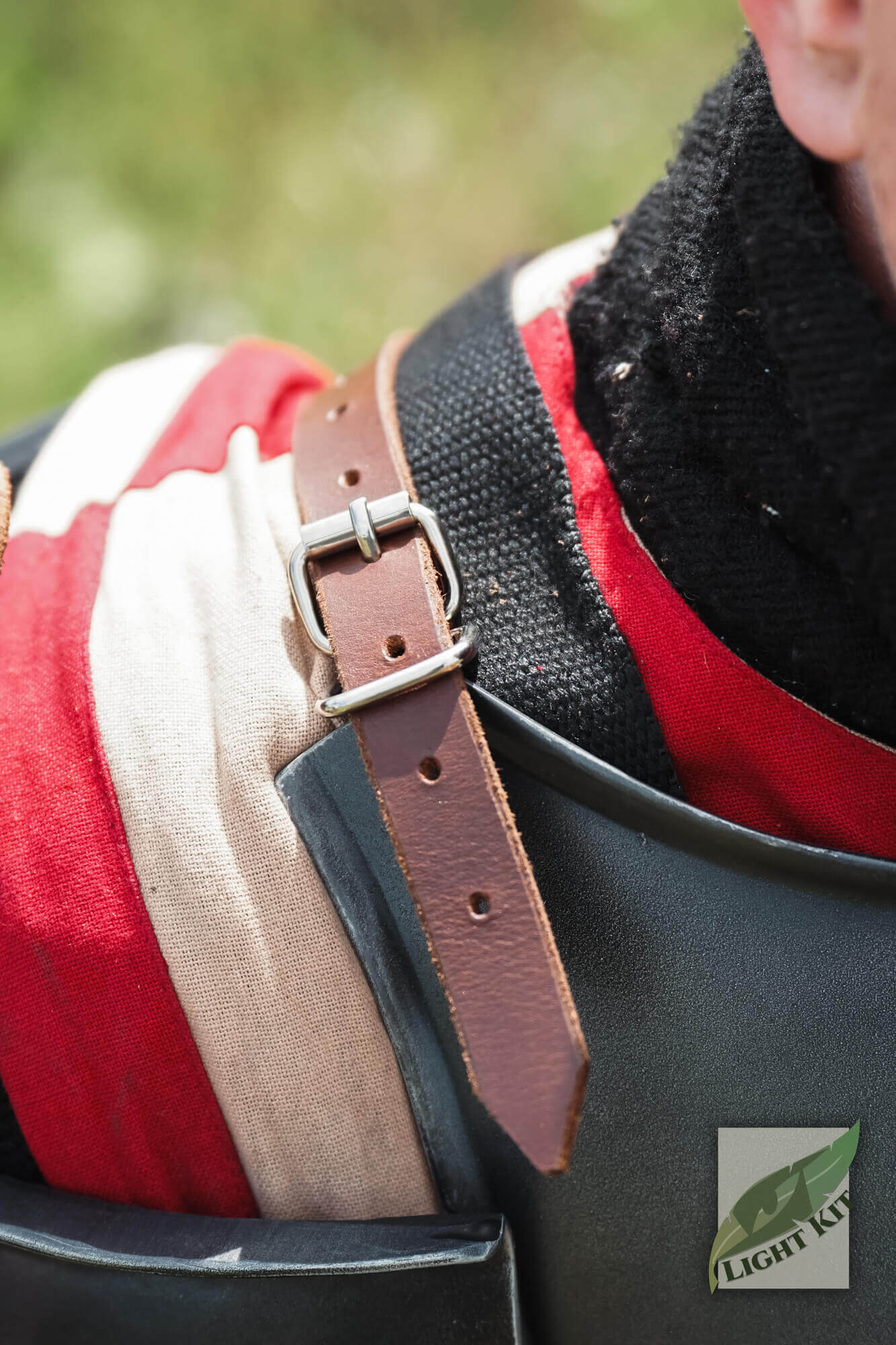 Close-up of Milanese Armour - Light Kit shoulder strap showcasing adjustable buckle detail.