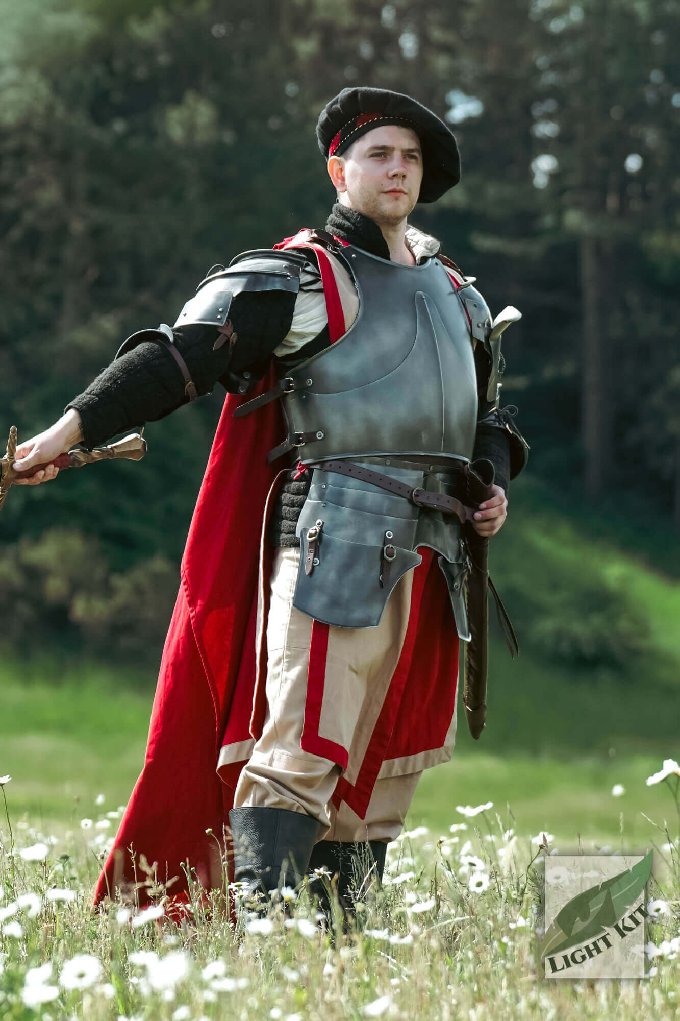 Milanese Armour - Light Kit worn by a knight in a striking pose against a natural background.
