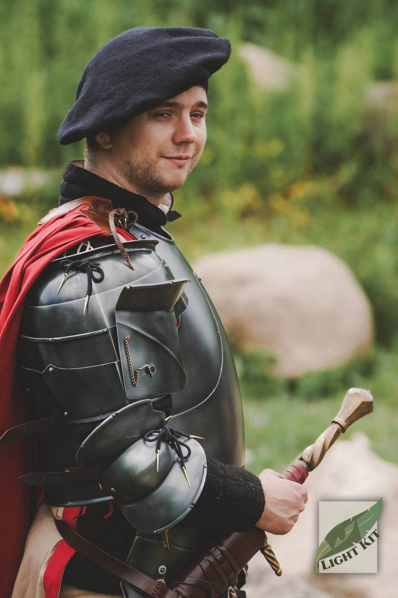 Milanese Couters - Light Kit worn by a man in armor, showcasing their protective design and lightweight features.