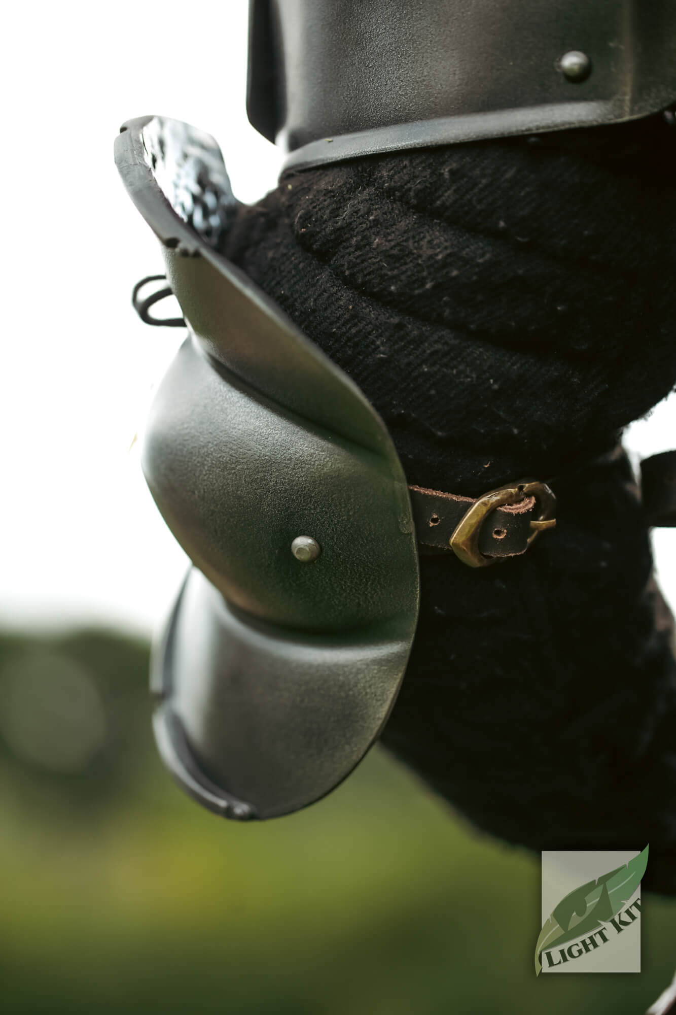 Milanese Couters - Light Kit showcasing detailed elbow protection with high-density polyurea material.