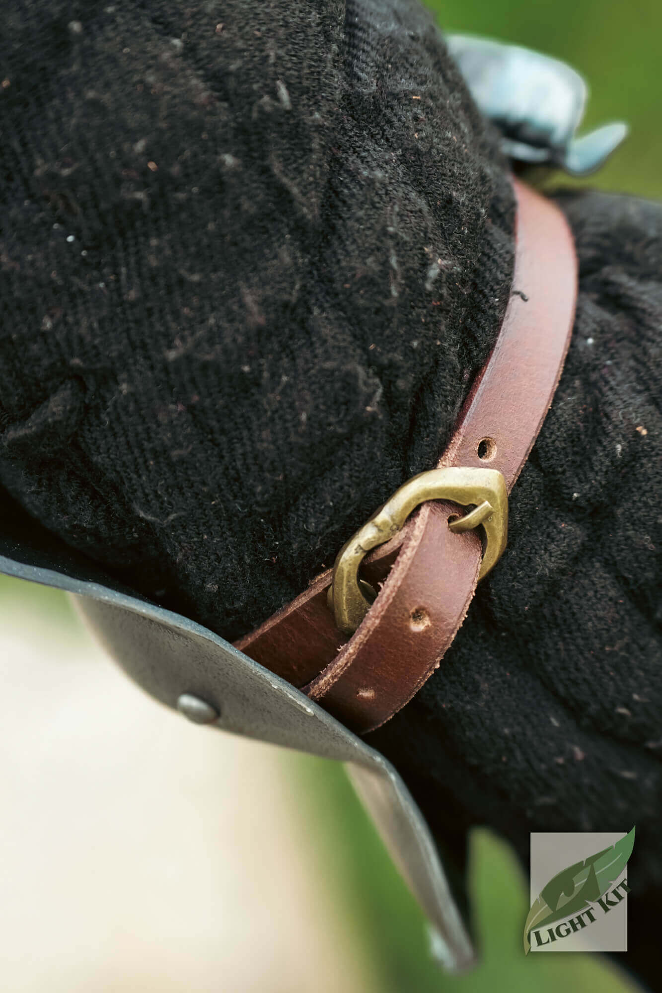 Milanese Couters - Light Kit showing the detailed belt strap and attachment for secure fitting.