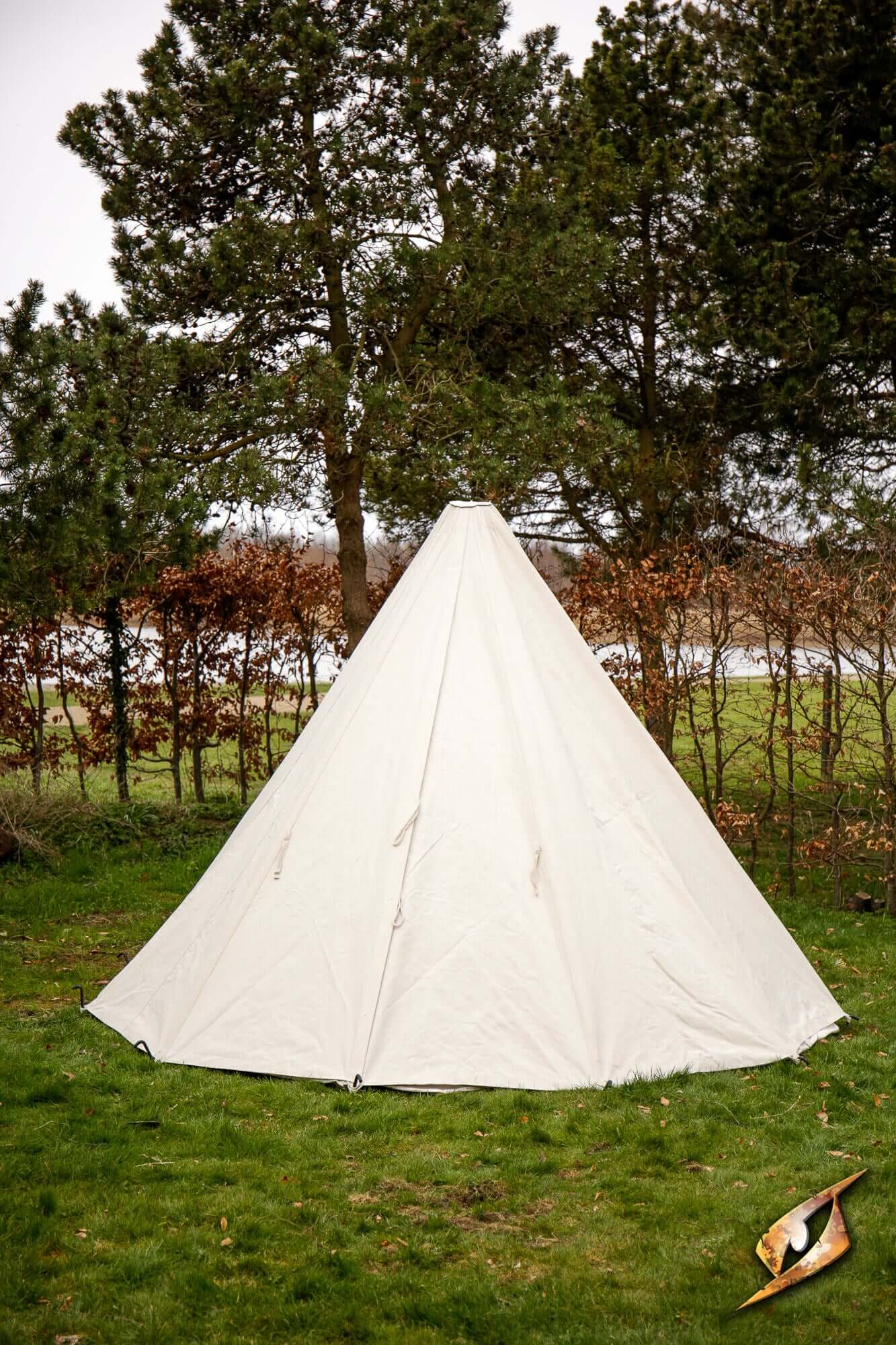 Complete Conical Tent - Compact set up in a grassy area surrounded by trees.