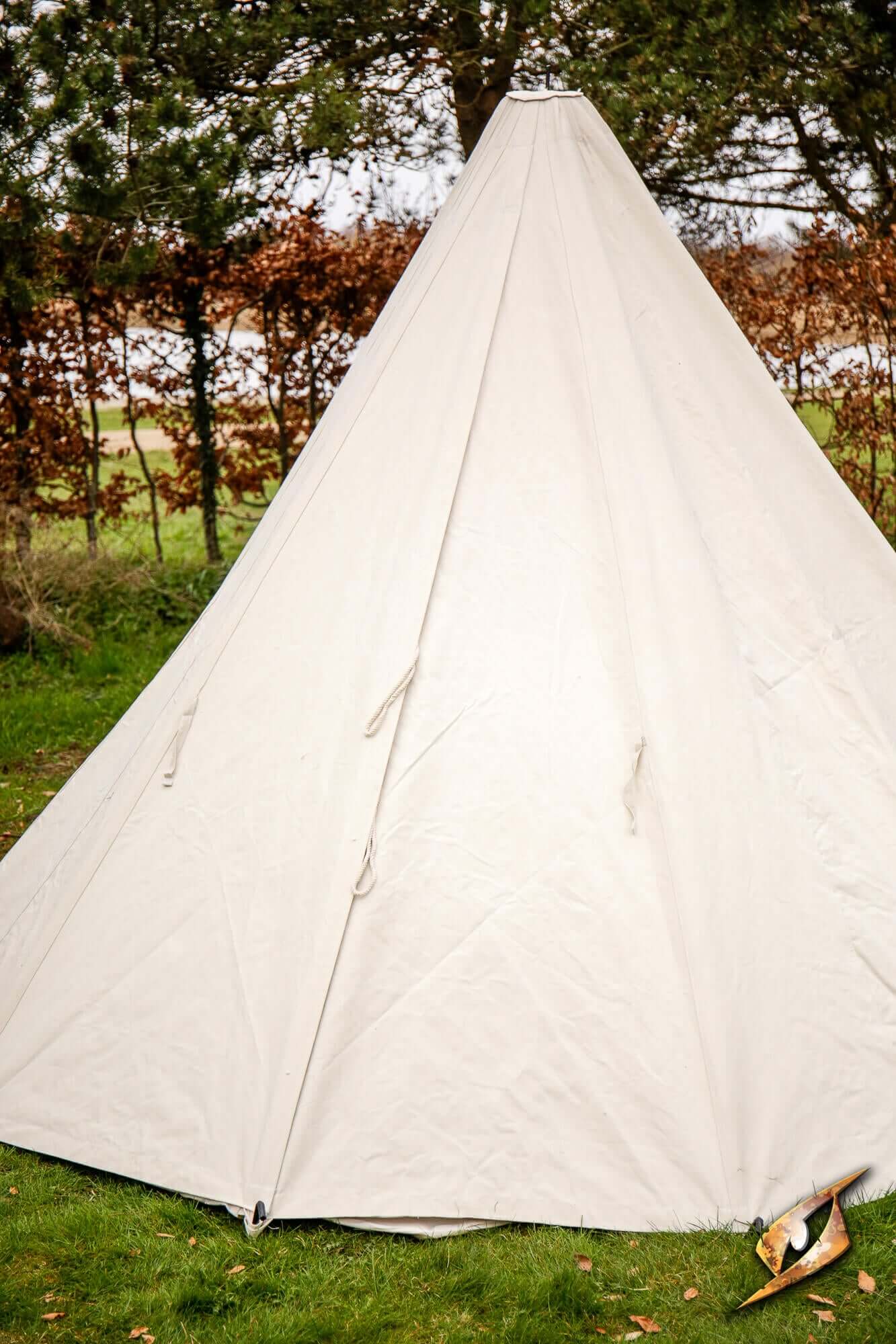 Complete Conical Tent - Compact set up in a natural outdoor setting, showcasing its simple yet effective design.