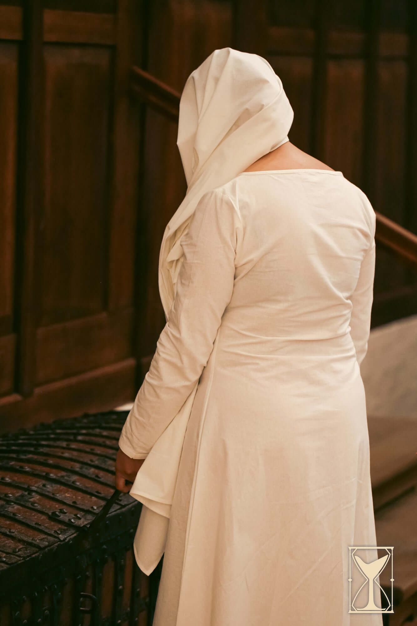 Rectangular Veil and Fillet - Cotton worn by a woman in historical costume, showcasing modesty and elegance.