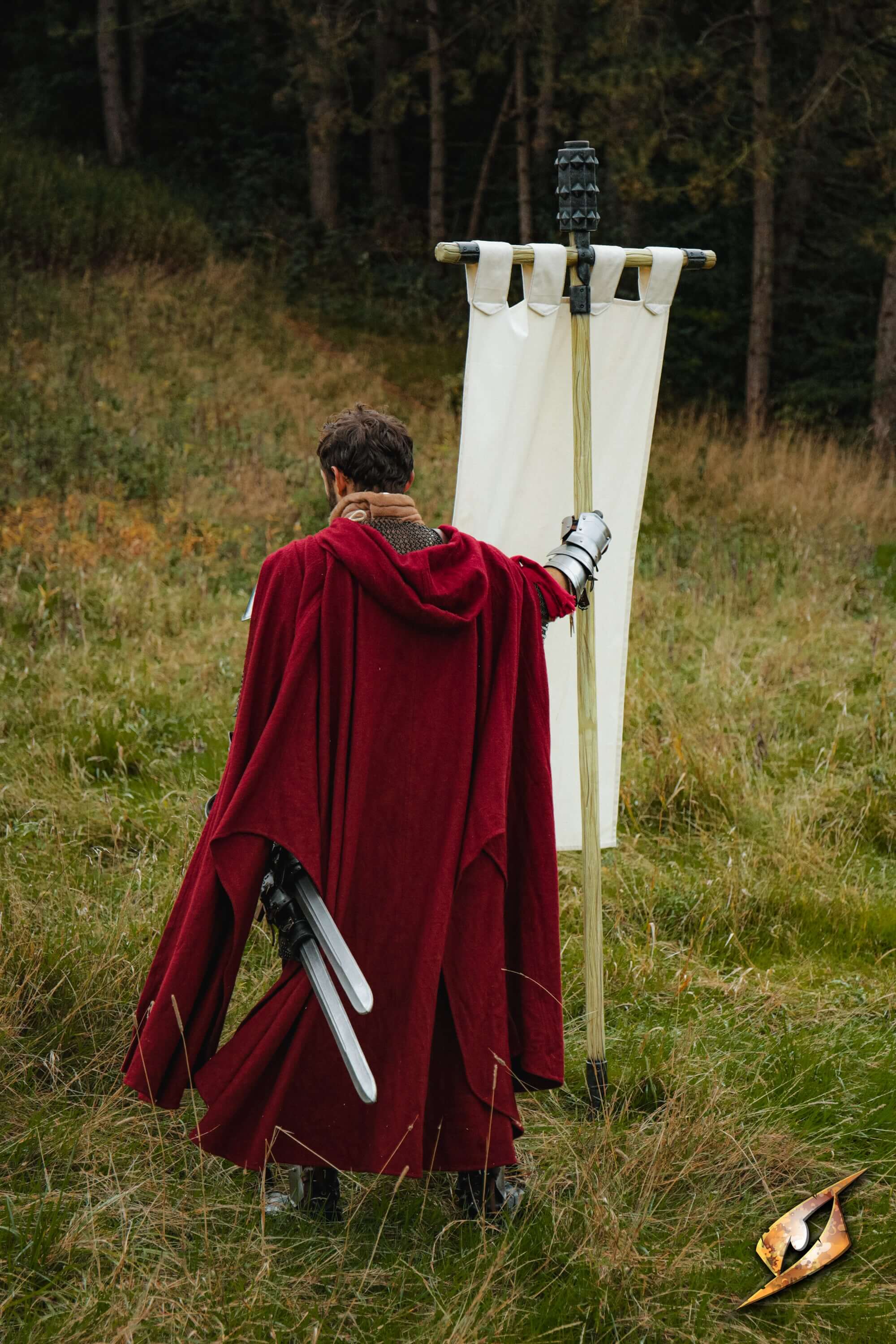 Complete Battle Standard Set - Spiked Mace Top displayed with a warrior in a red cloak holding a banner.