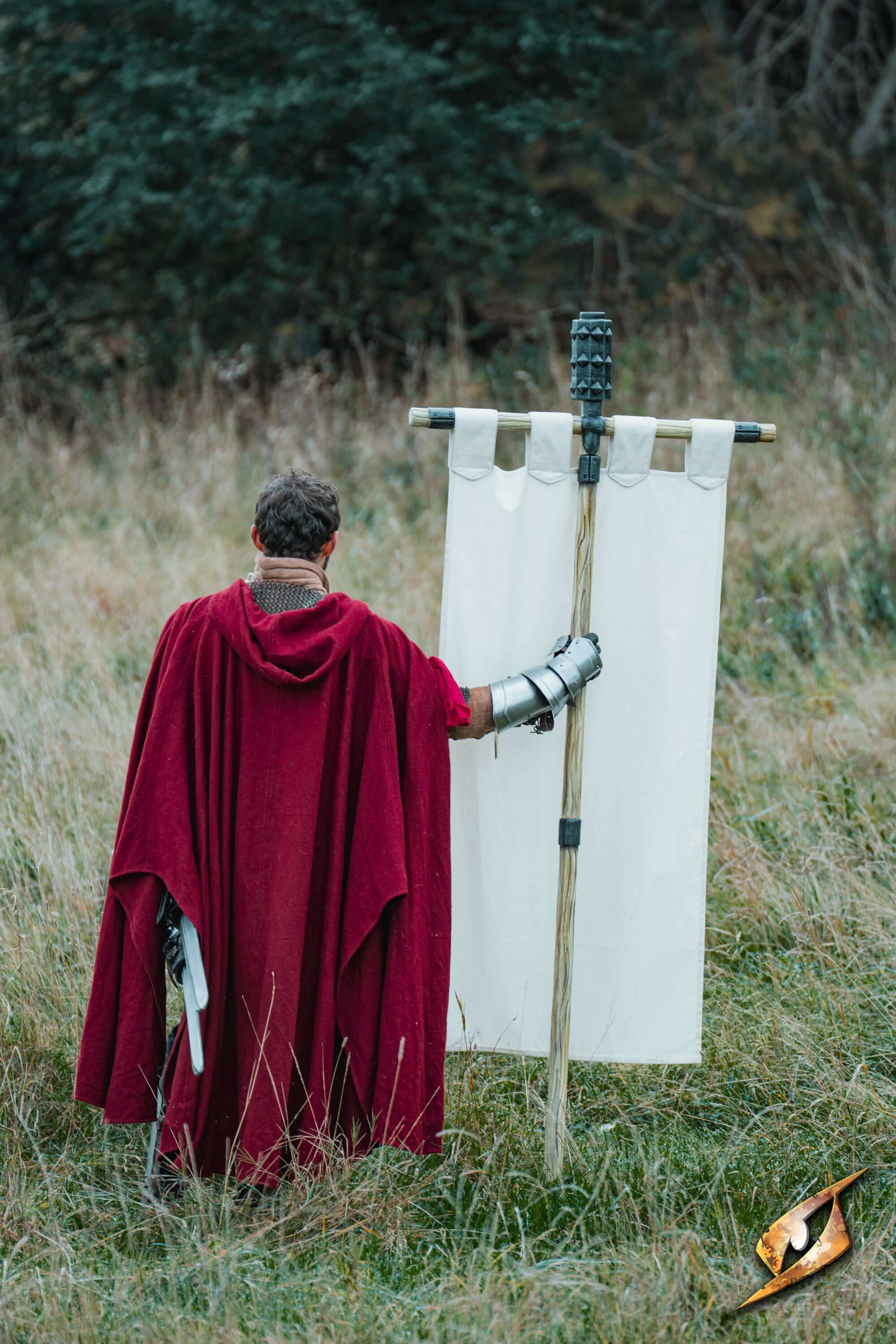 Complete Battle Standard Set - Spiked Mace Top held by a figure in a red cloak, set against a grassy field.