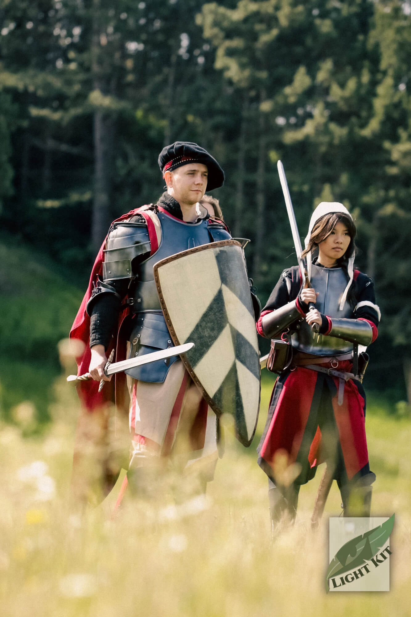 Milanese Complete Set - Light Kit featuring two armored knights ready for battle in a natural setting