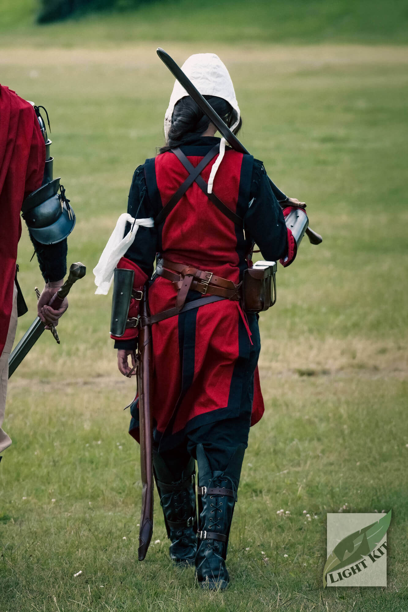 RFB Armour Set - Light Kit worn by a figure walking, showcasing its knightly silhouette and high-density polyurea fabric.