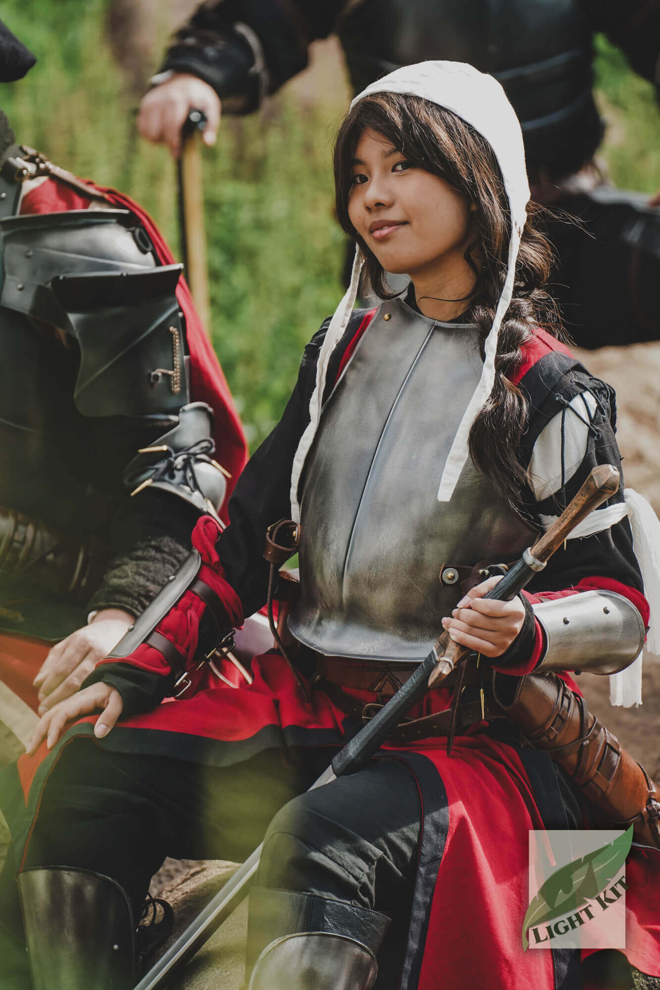 RFB Armour Set - Light Kit showcased on a young woman in a knightly costume, featuring durable polyurea craftsmanship.