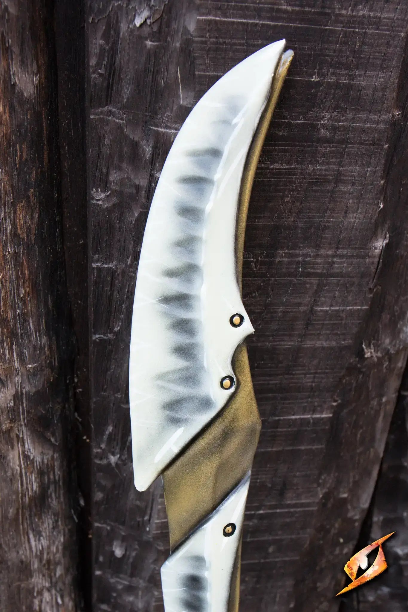 Bone Blade - 95 cm detailed view with curved blade and horned crossguard on wooden background.