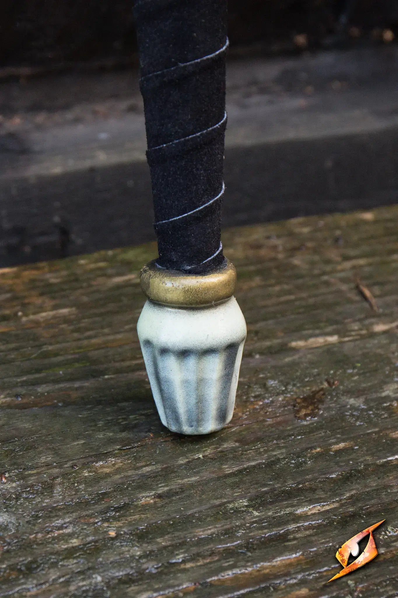 Detail of the hilt on the Bone Blade - 95 cm, showcasing the unique pommel and textured grip.