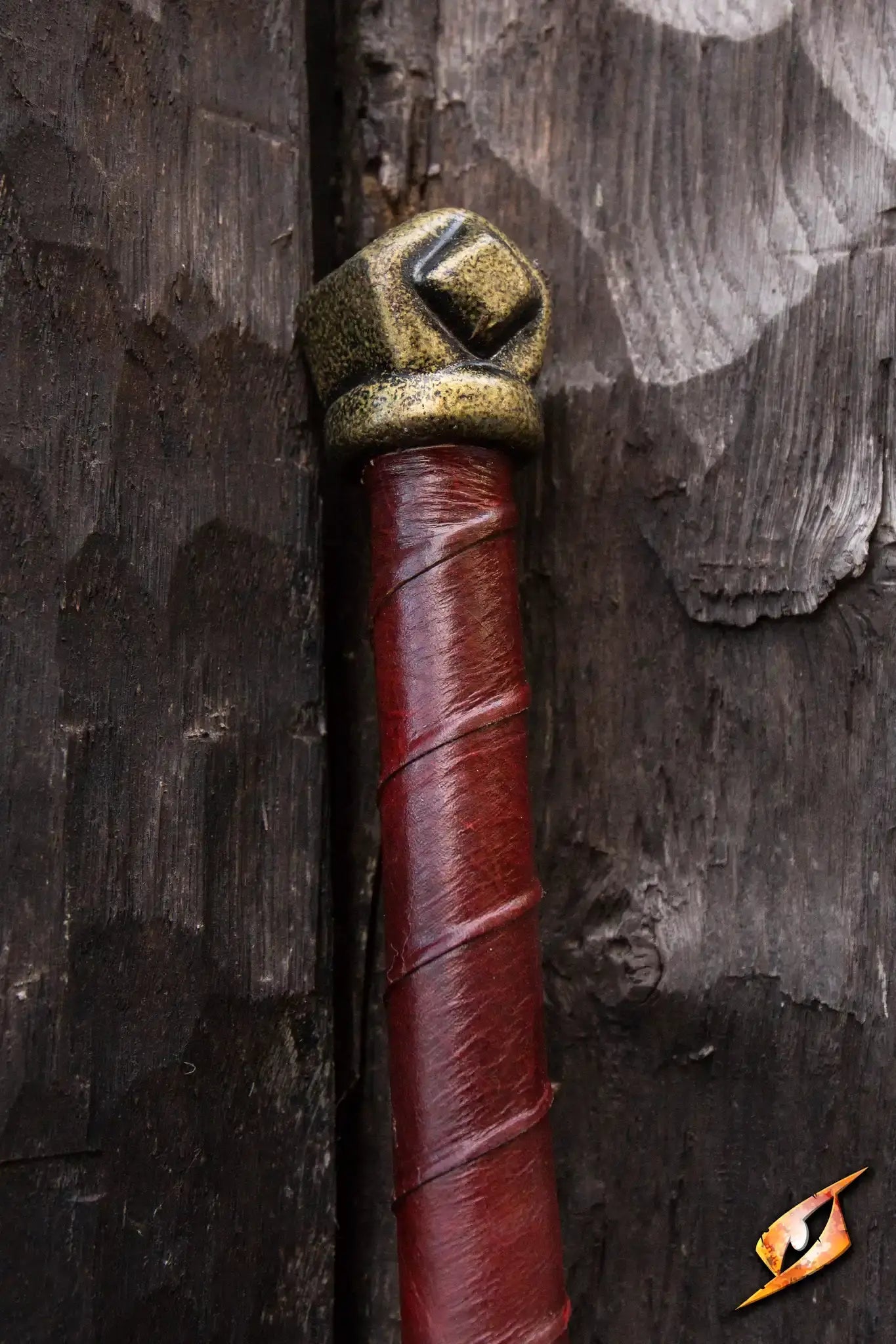 Baal - 140 cm sword hilt showcasing Celtic design against a wooden background, symbolizing power and confidence.