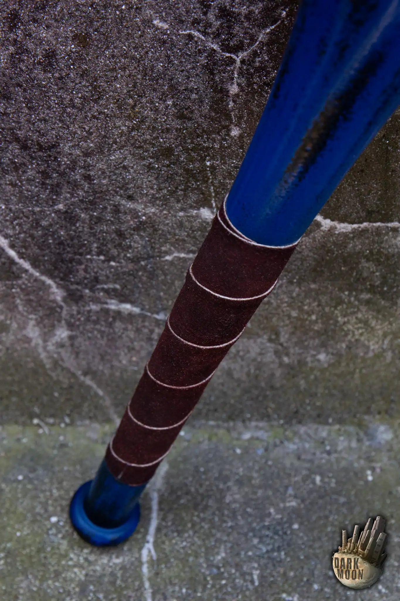 Close-up view of the blue Barbed Wire Bat foam baseball bat with wrapped grip, perfect for post-apocalyptic scenarios.